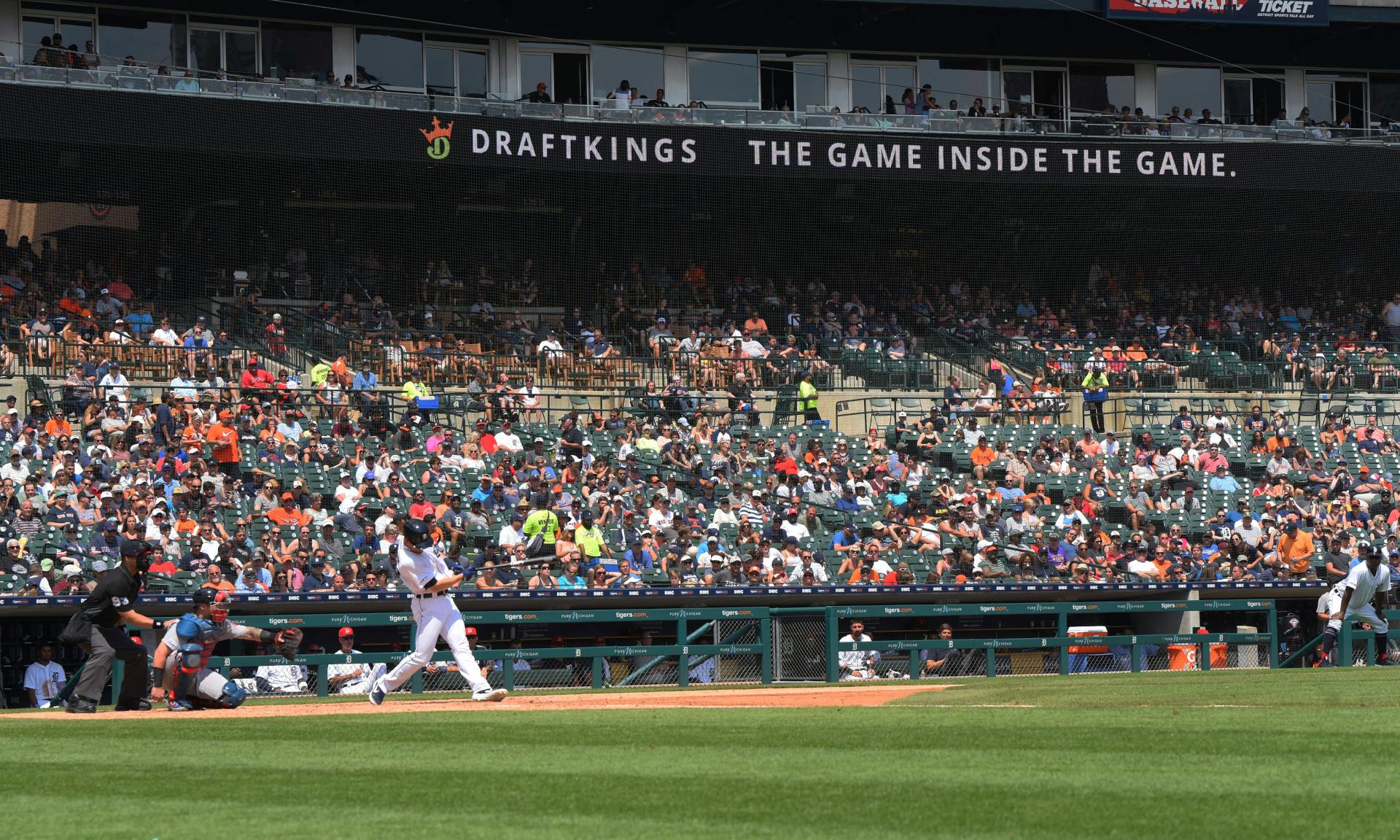 An advertisement for DraftKings is shown on the scoreboard during the game between the Boston Red Sox and the Detroit Tigers