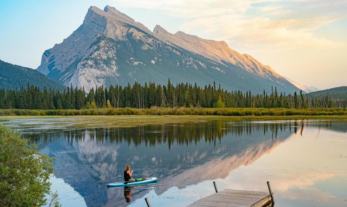 Woman on kayak in Canmore, Canada