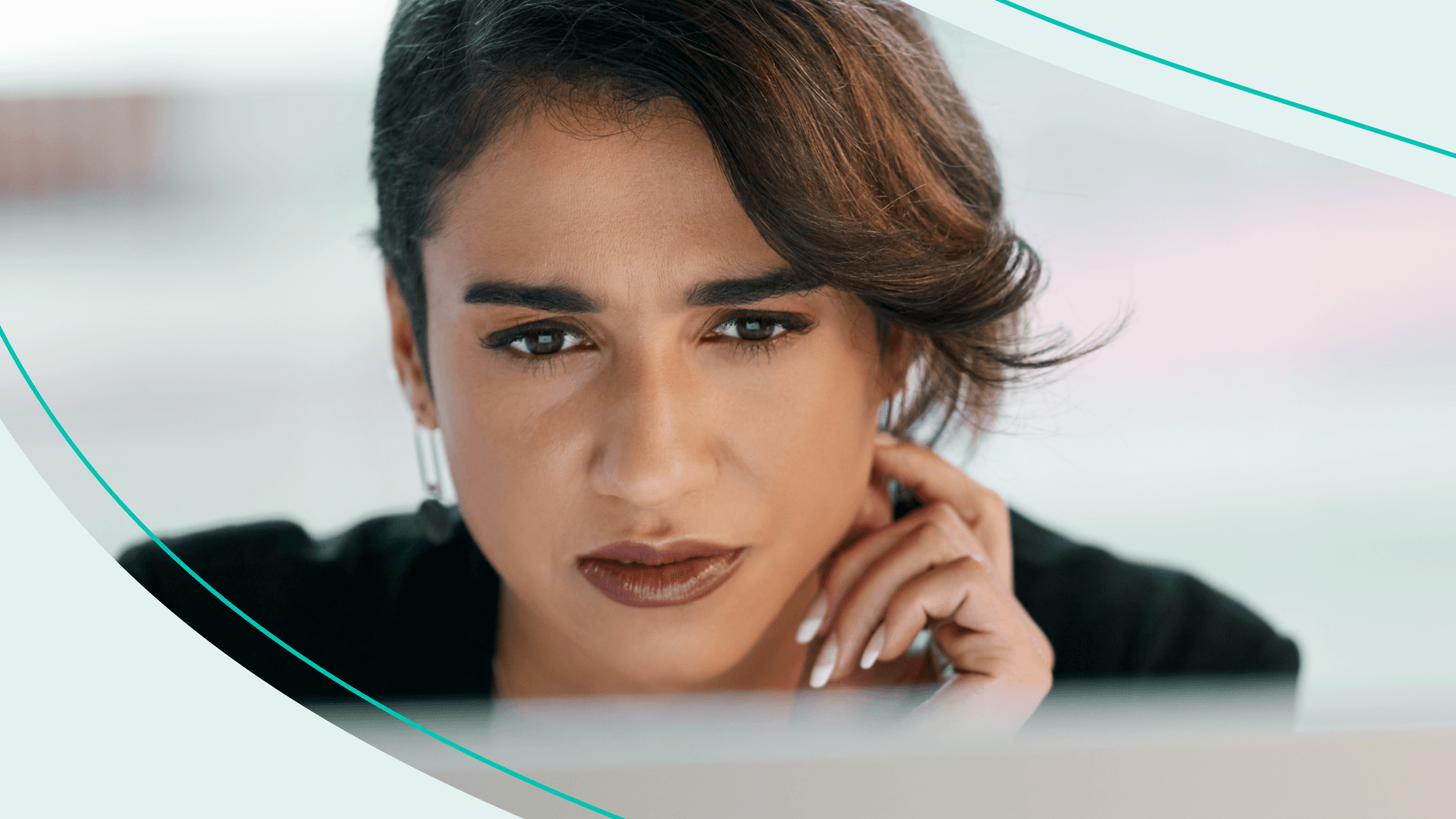 woman looking at computer screen