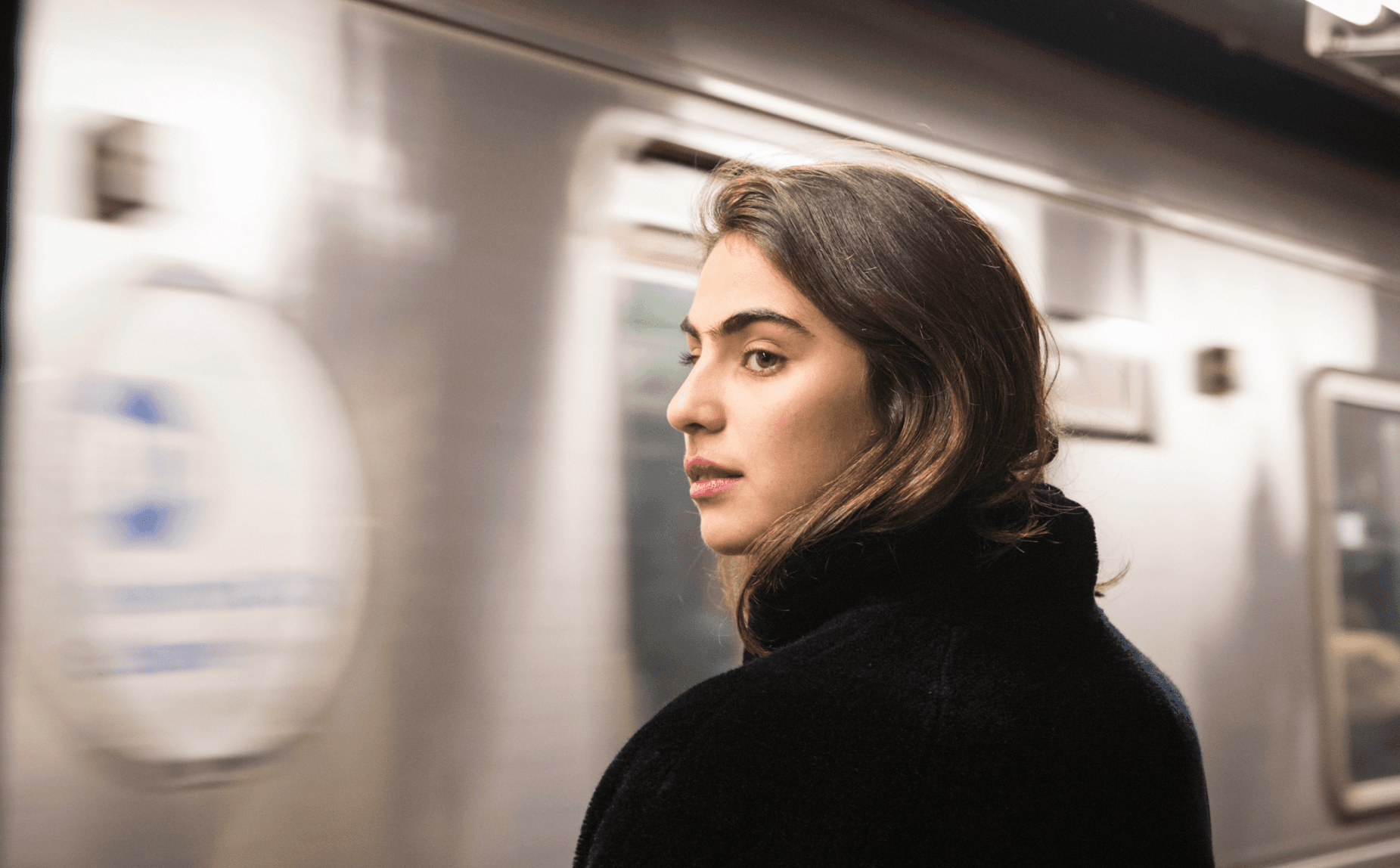 A woman getting ready to take the subway