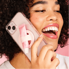 woman on phone with lanolips