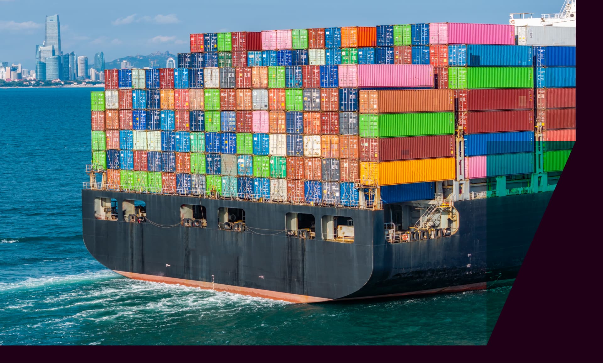 A full container ship at sea.