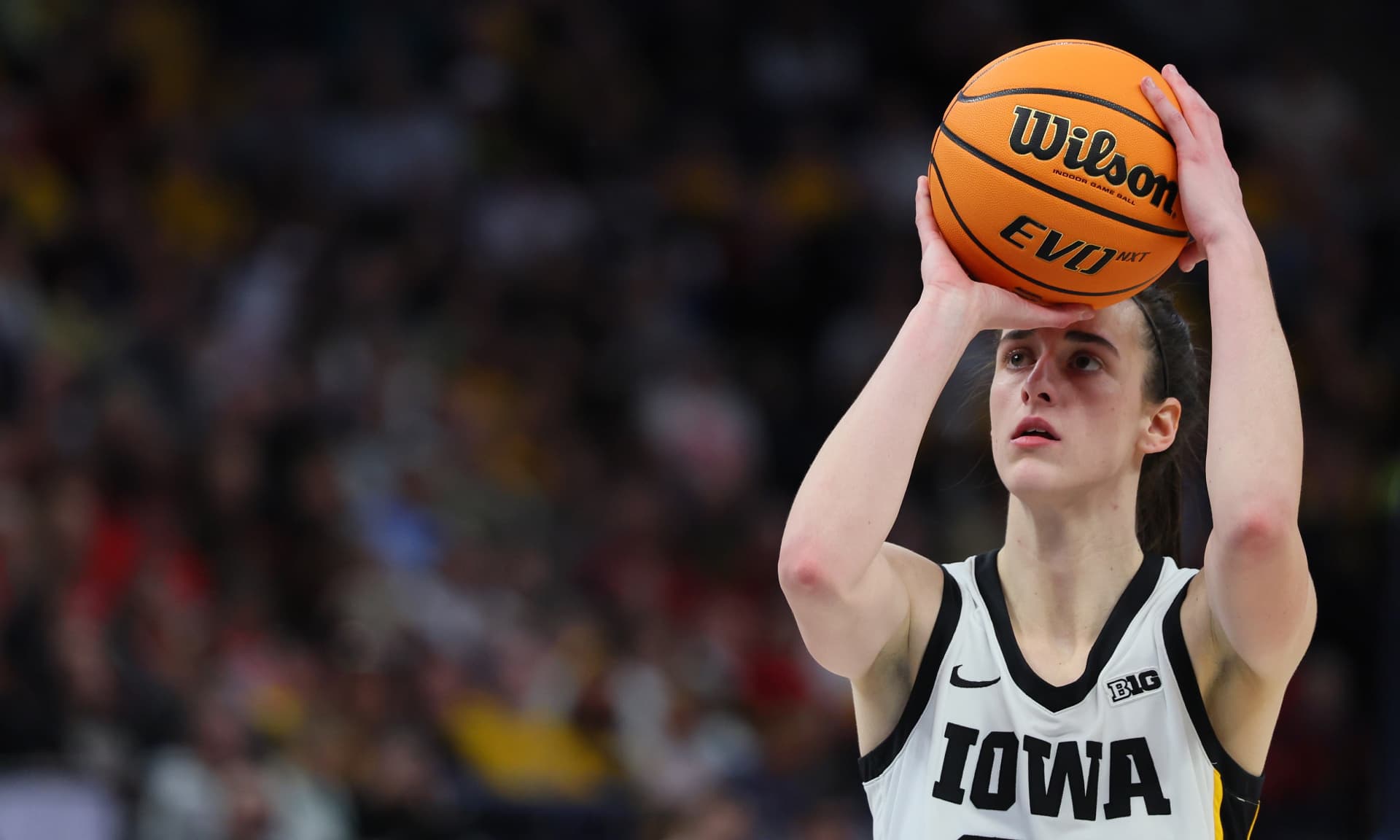Caitlin Clark shooting a basketball
