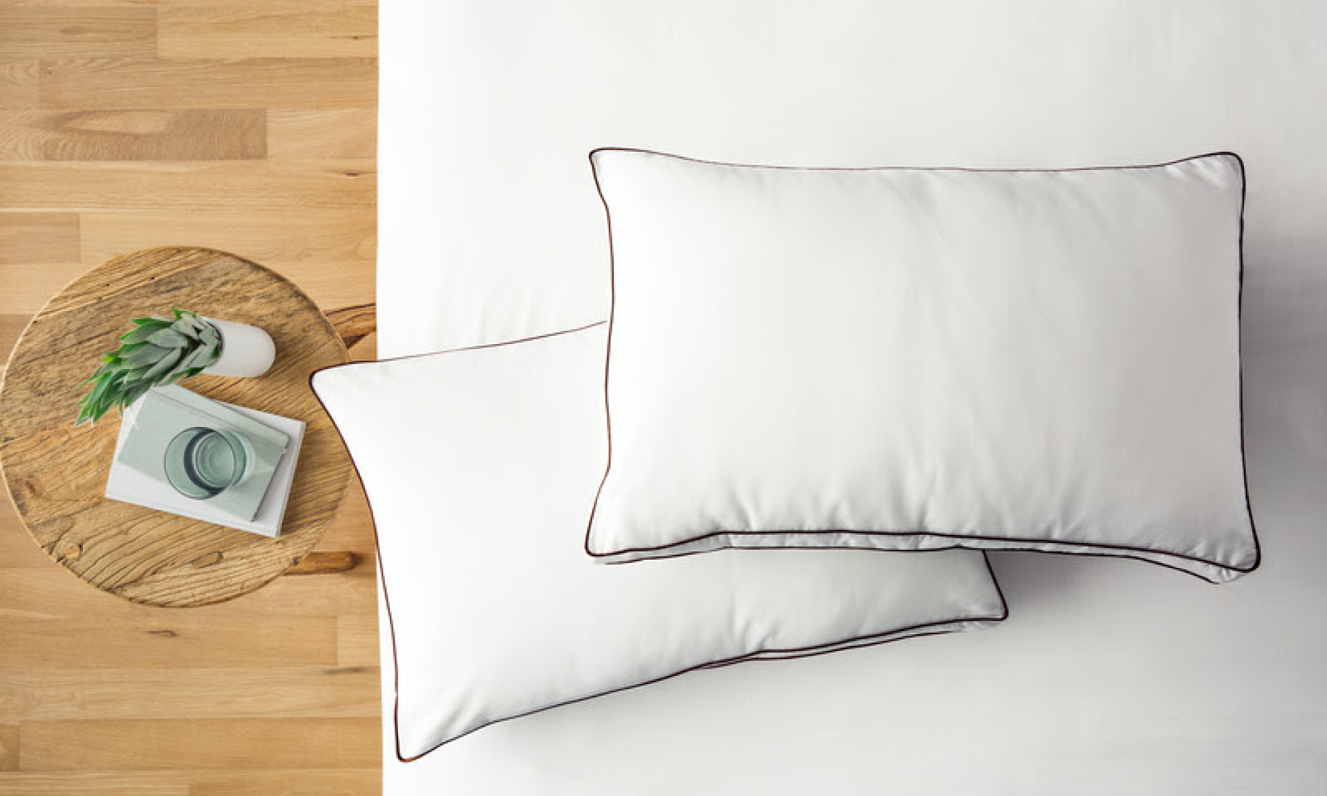 Saatva pillows on a white bed
