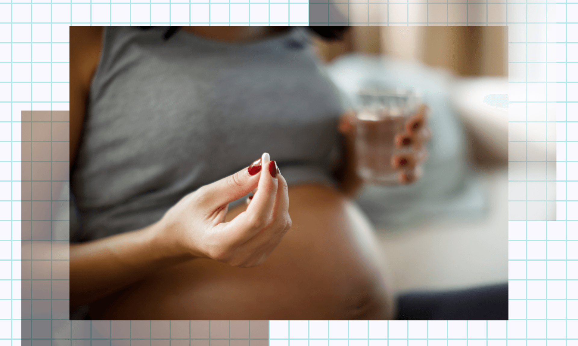 Pregnant woman holding medicine