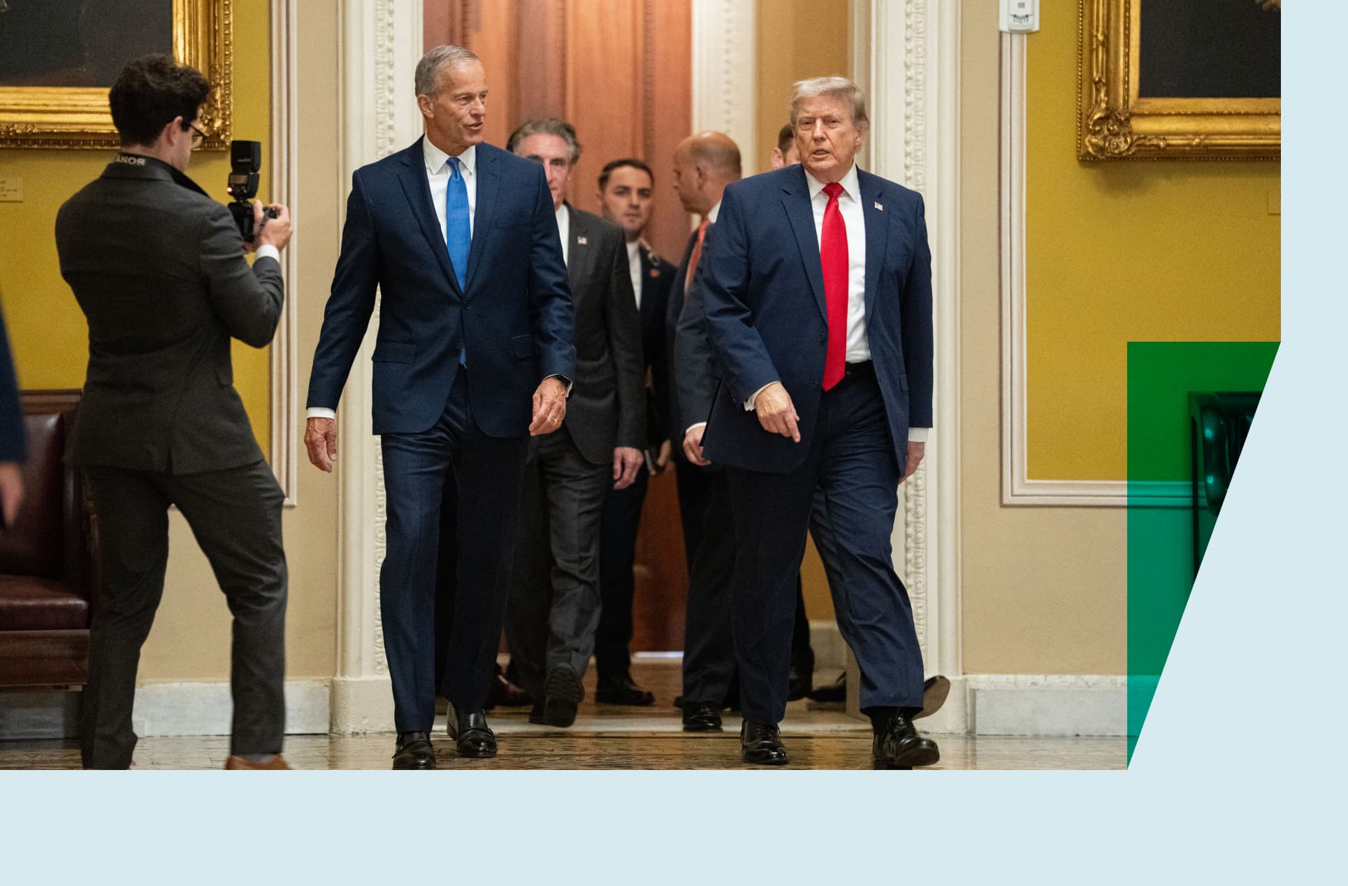 US President Donald Trump walks with Senate Majority Leader John Thune, (R-SD), on the way to a lunch meeting with Senate Republicans at the US Capitol