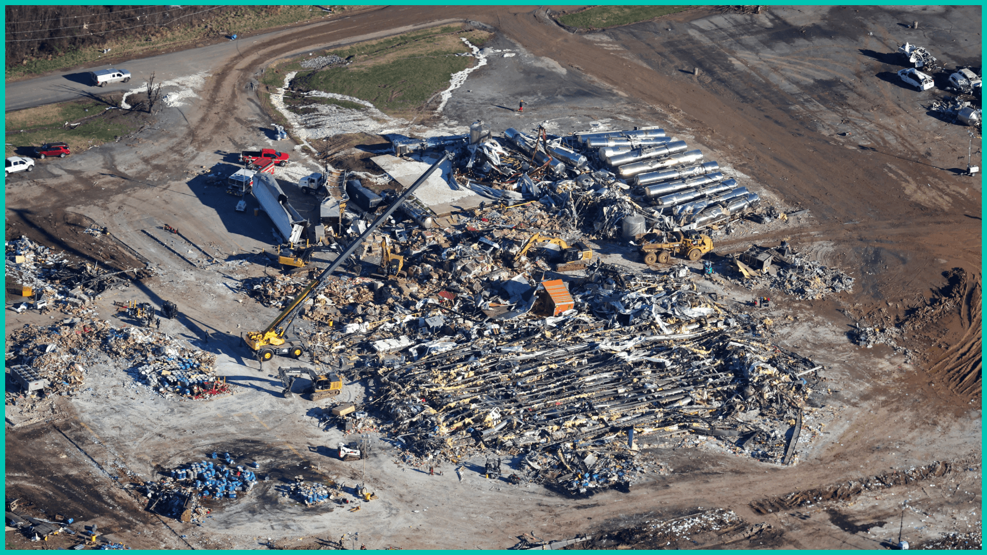 In this aerial view, crews clear the rubble at the Mayfield Consumer Products candle factory after it was destroyed by a tornado