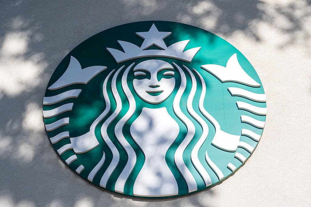 The Starbucks logo is displayed at a Starbucks store.