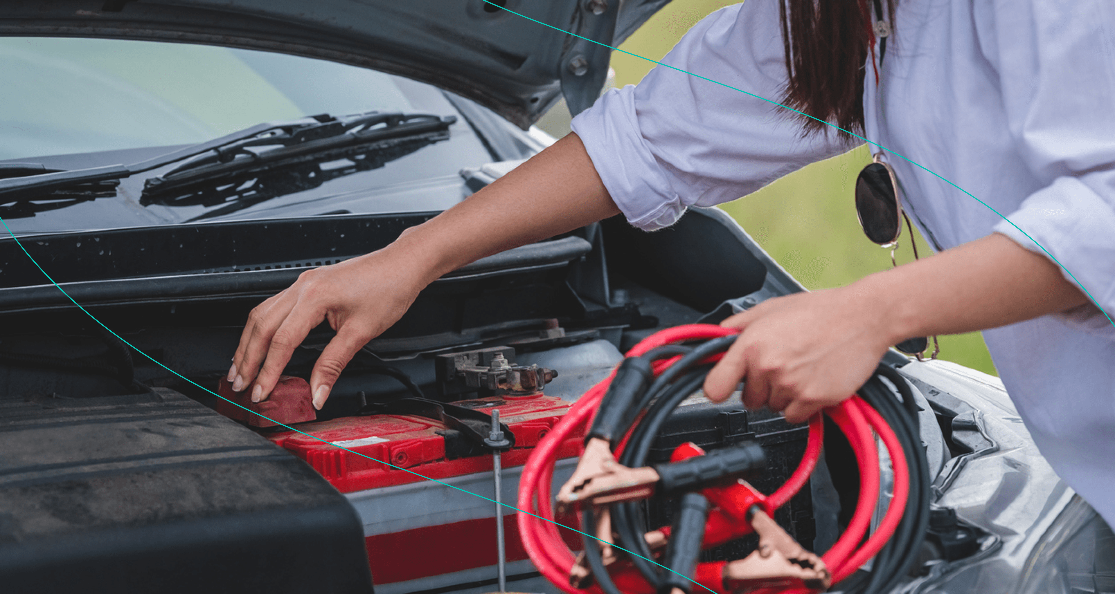 Person Holding Jumper Cables