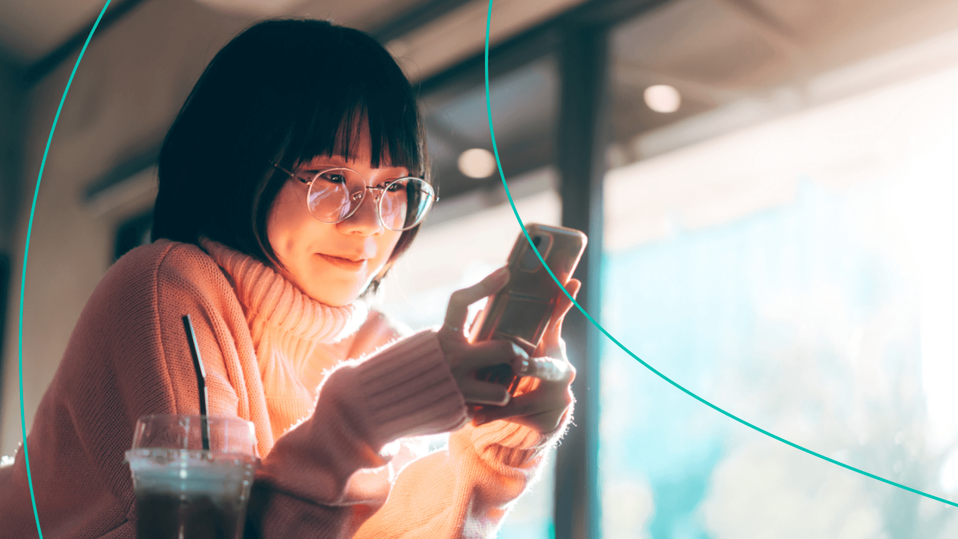Woman smiling at phone