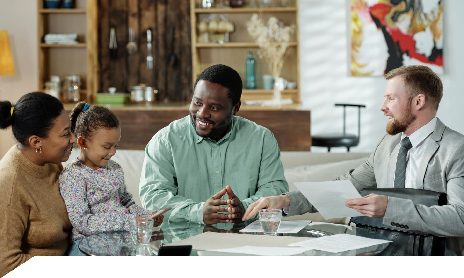 family sitting with financial planner