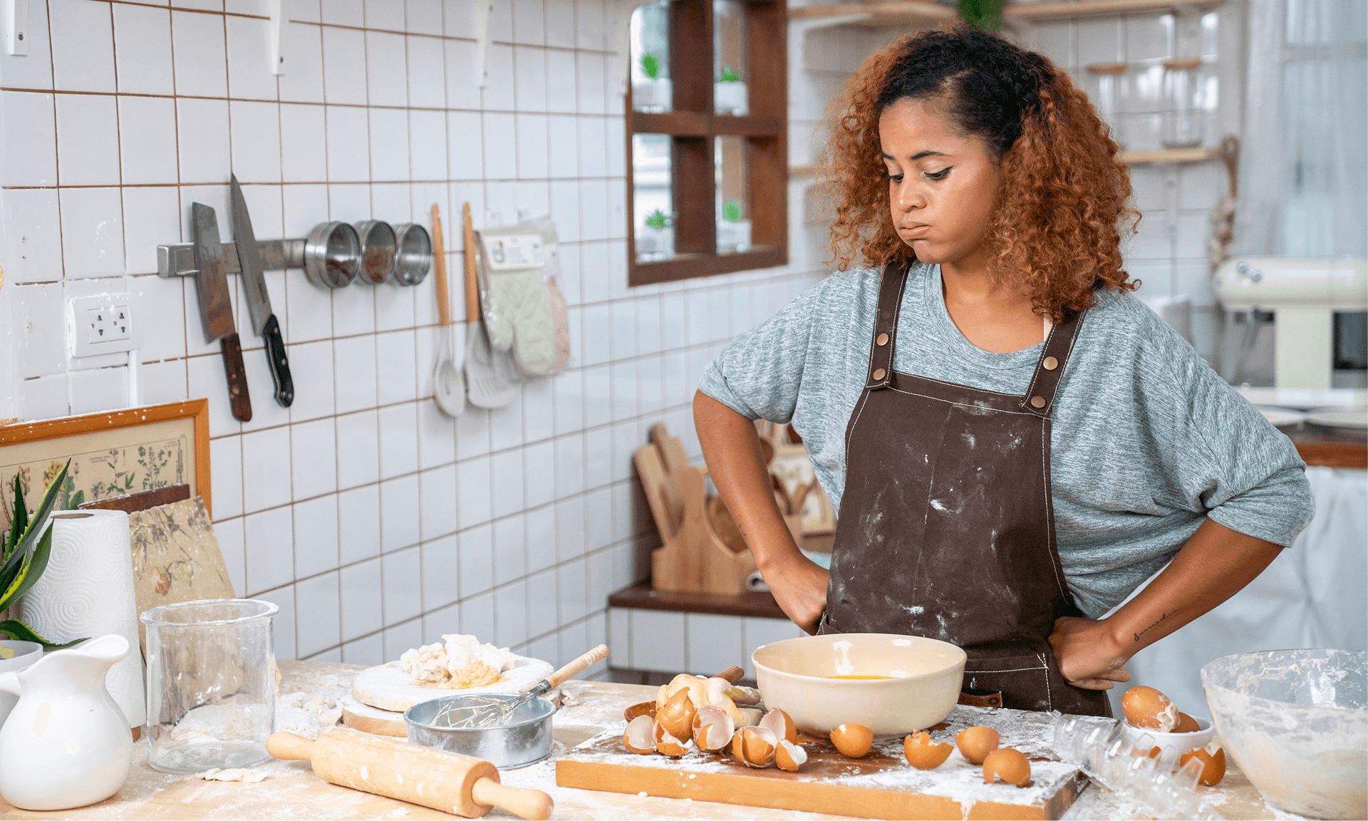 Woman overwhelmed in kitchen