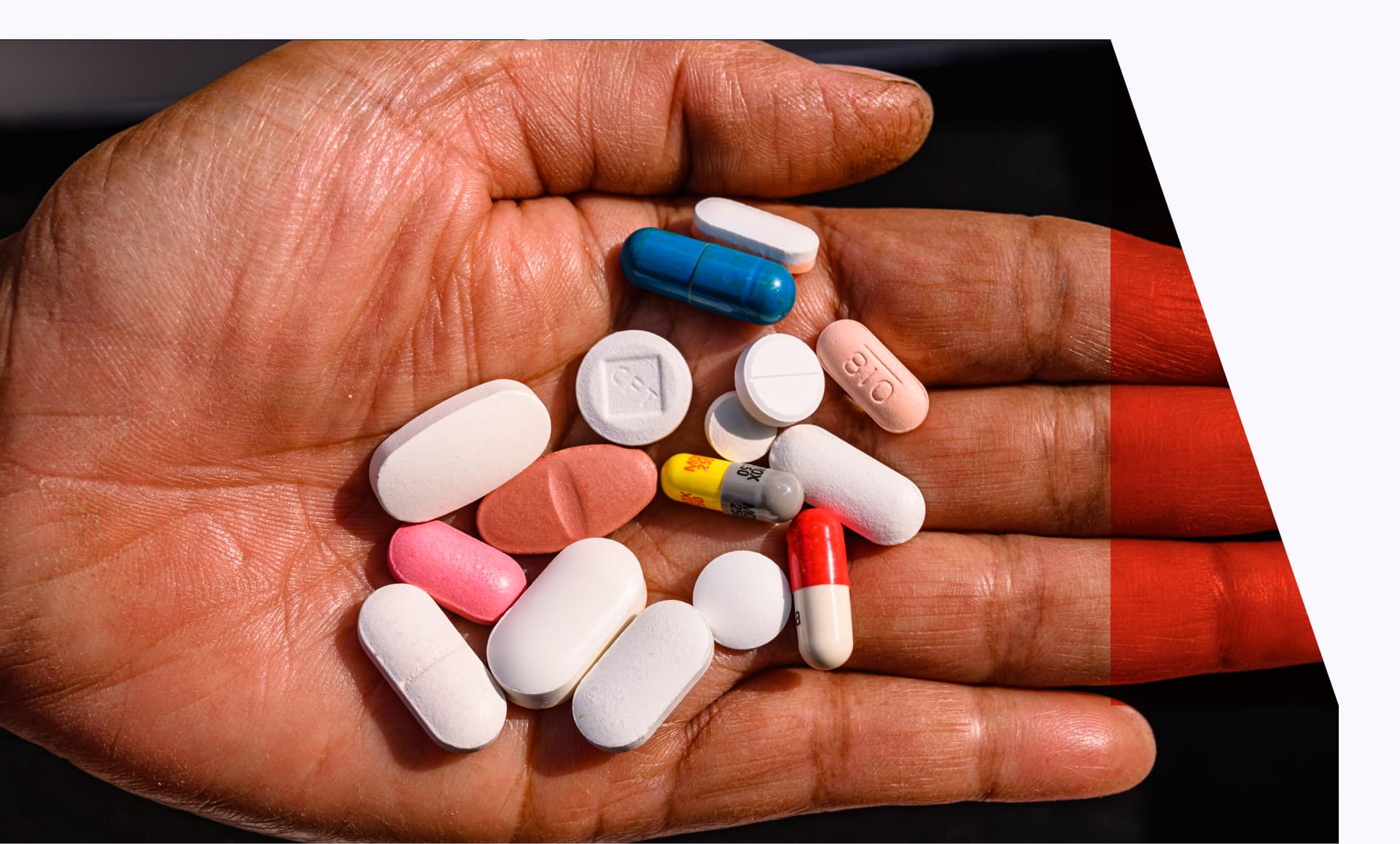 Person holding pills