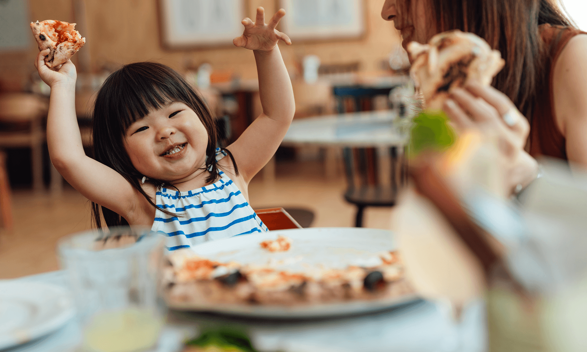 Kid with pizza