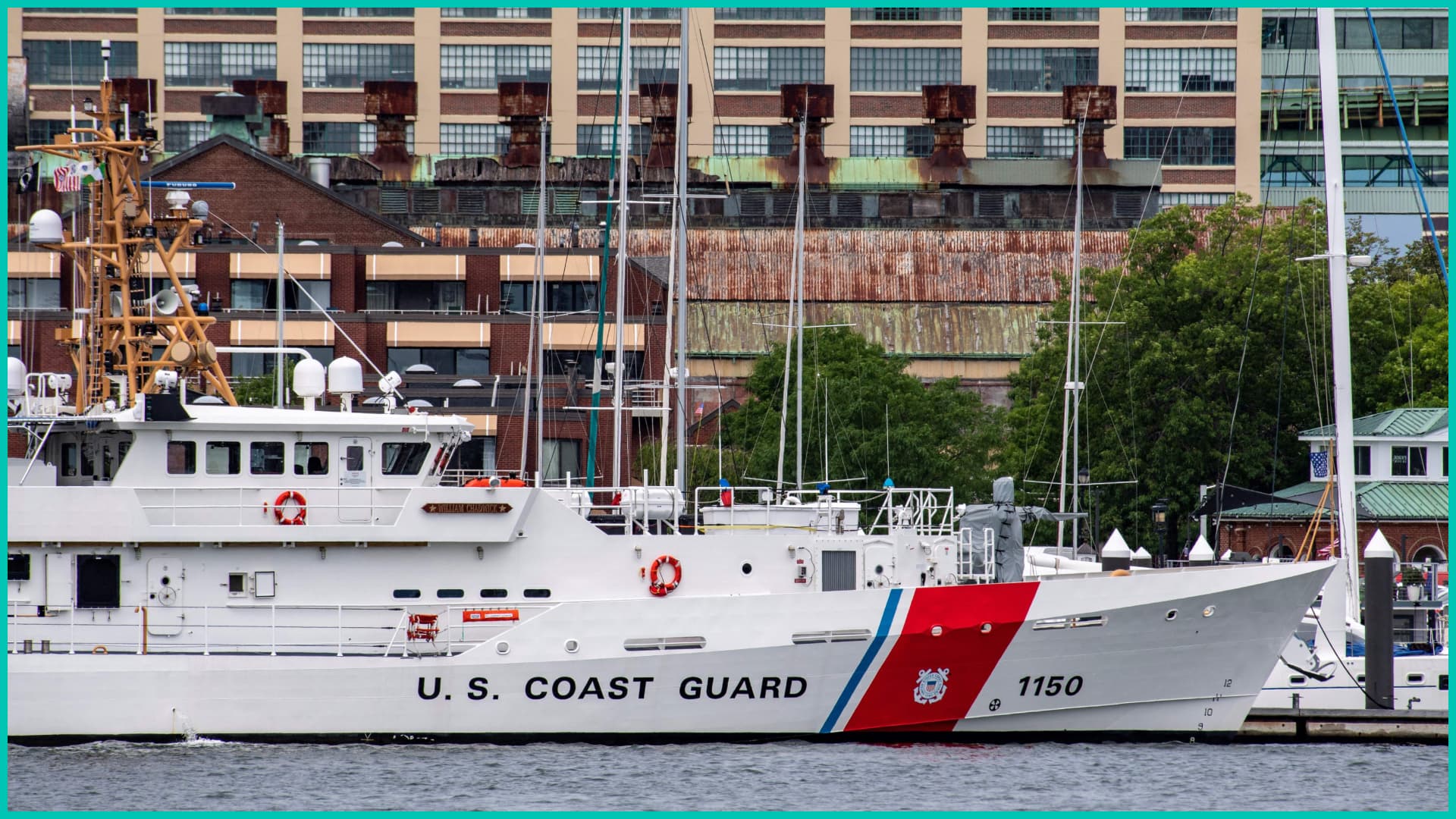 A US Coast Guard vessel sits in port in Boston Harbor across from the US Coast Guard Station Boston in Boston, Massachusetts, on June 19, 2023.