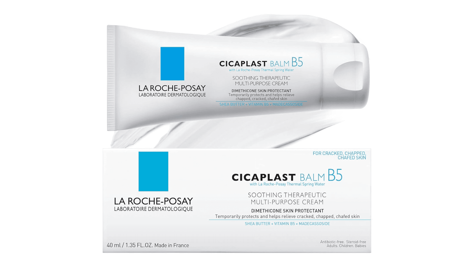 Tube of skincare with blue accent and a smear of product in the background