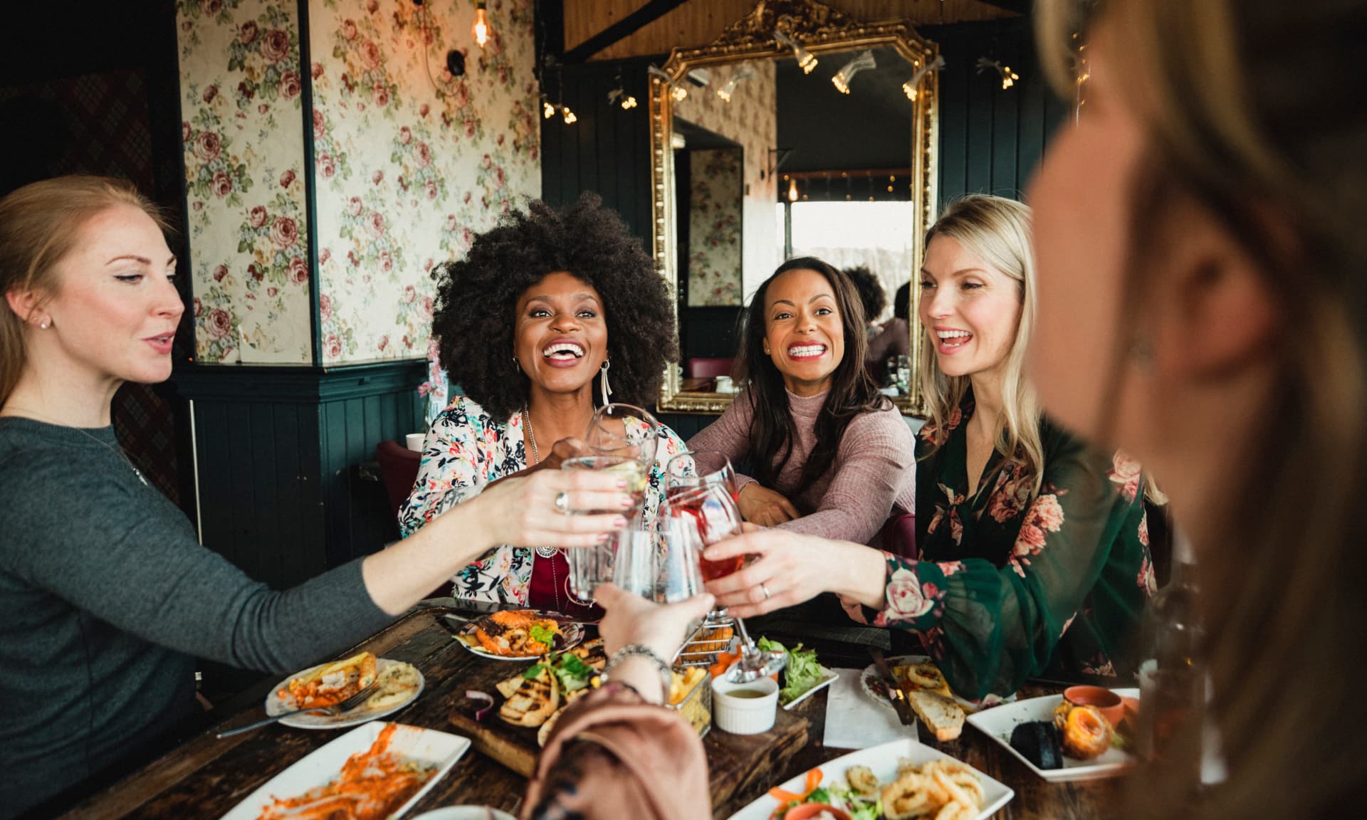 Group of friends having dinner at a restaurant.