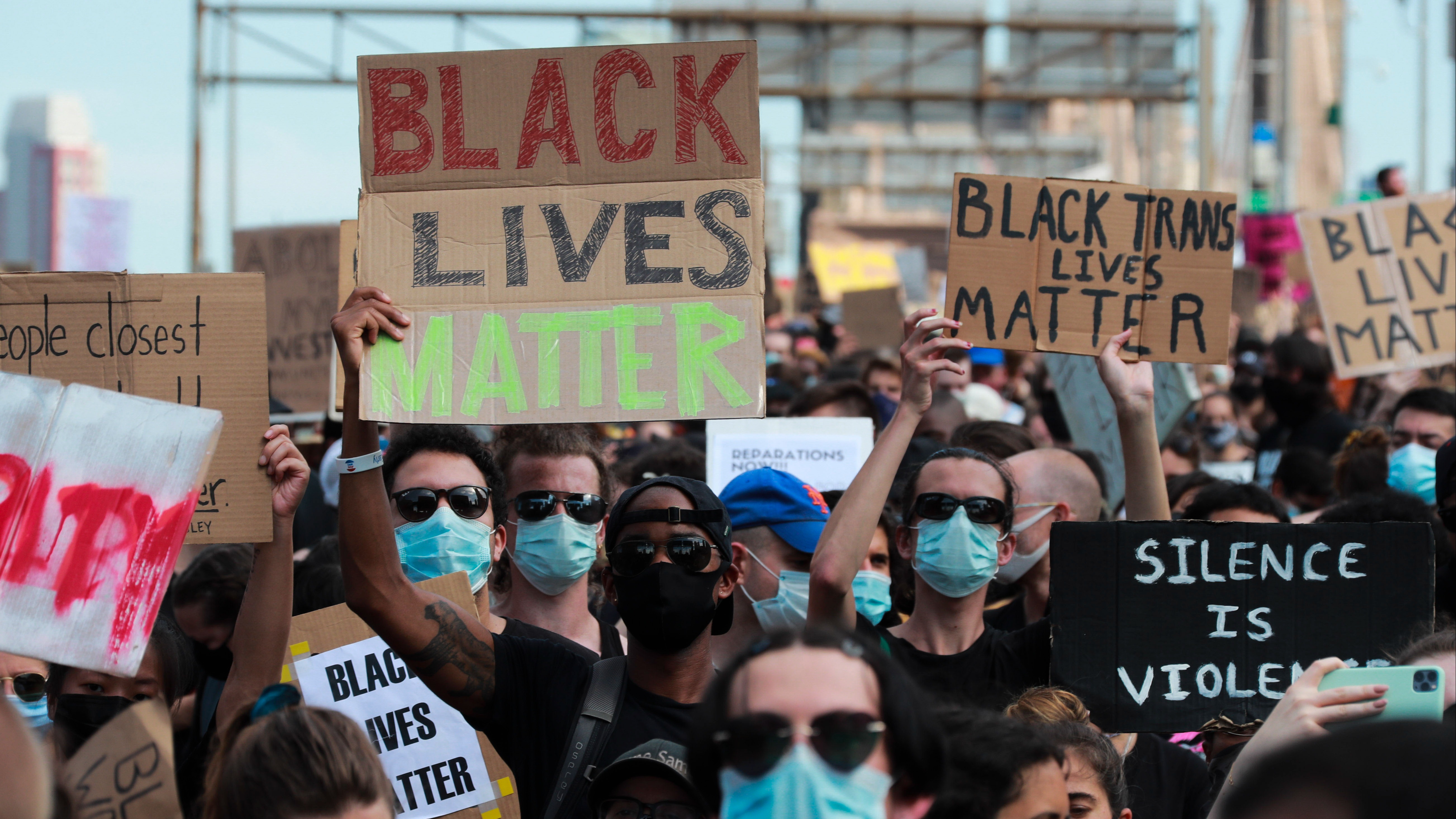 Demonstrators march through Brooklyn Bridge on June 19, 2020.