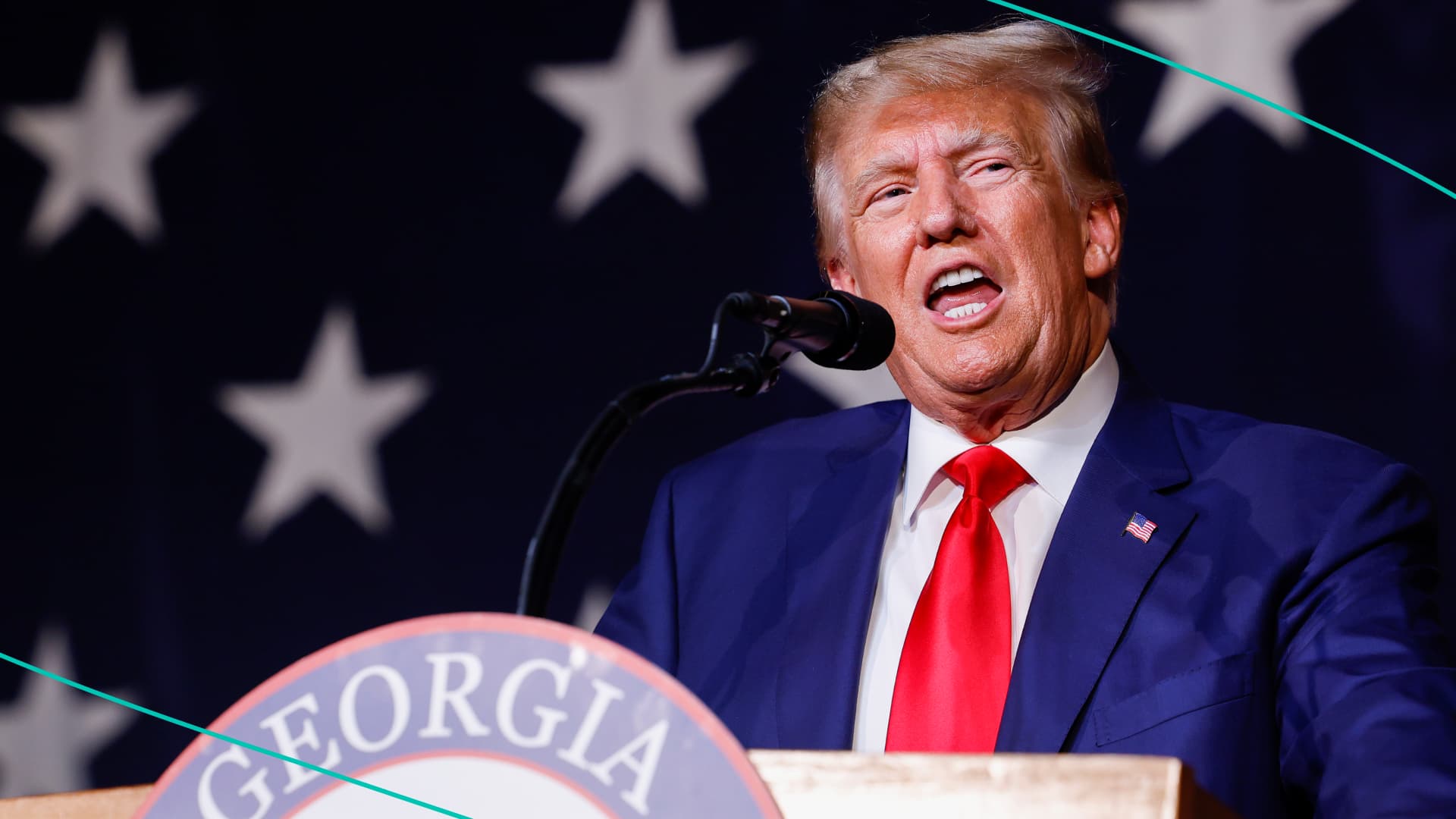 President Trump speaking at a podium