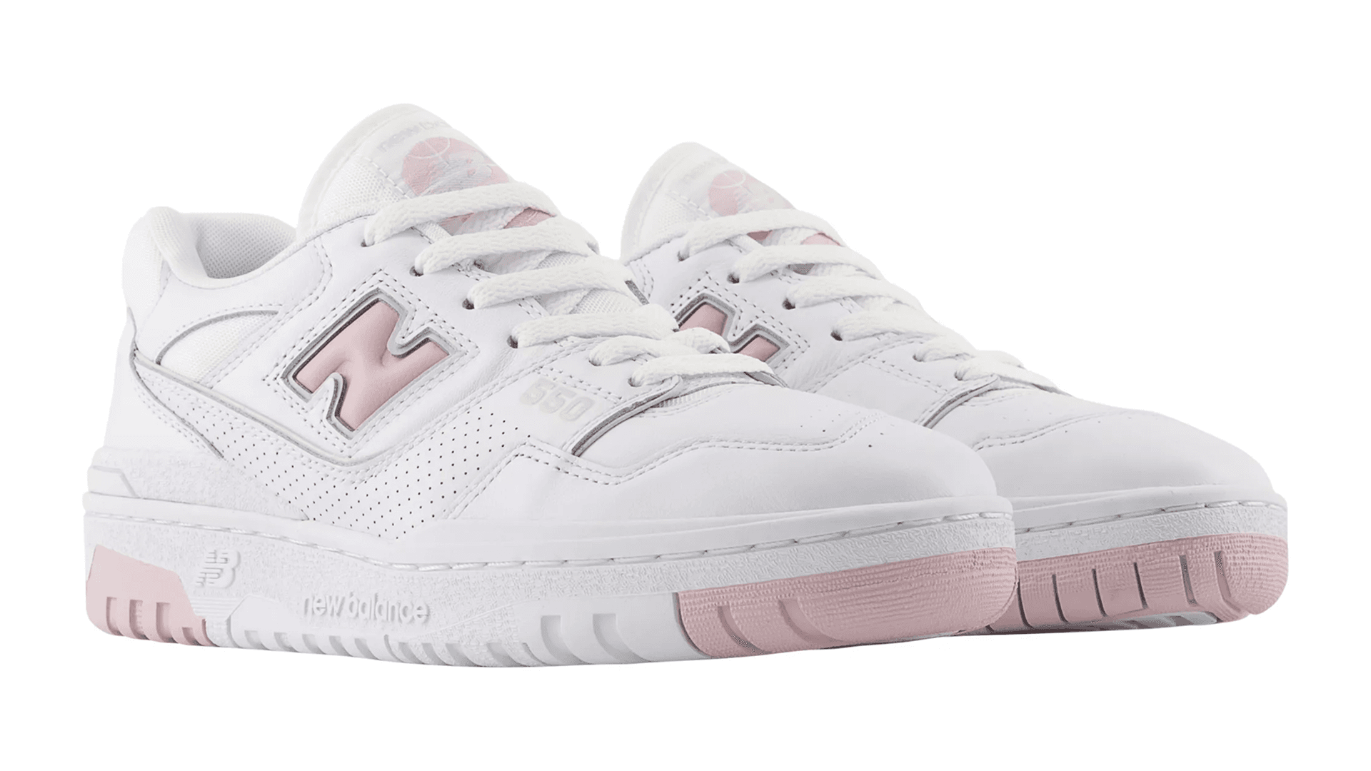 White sneakers with pink "N" logo and pink soles