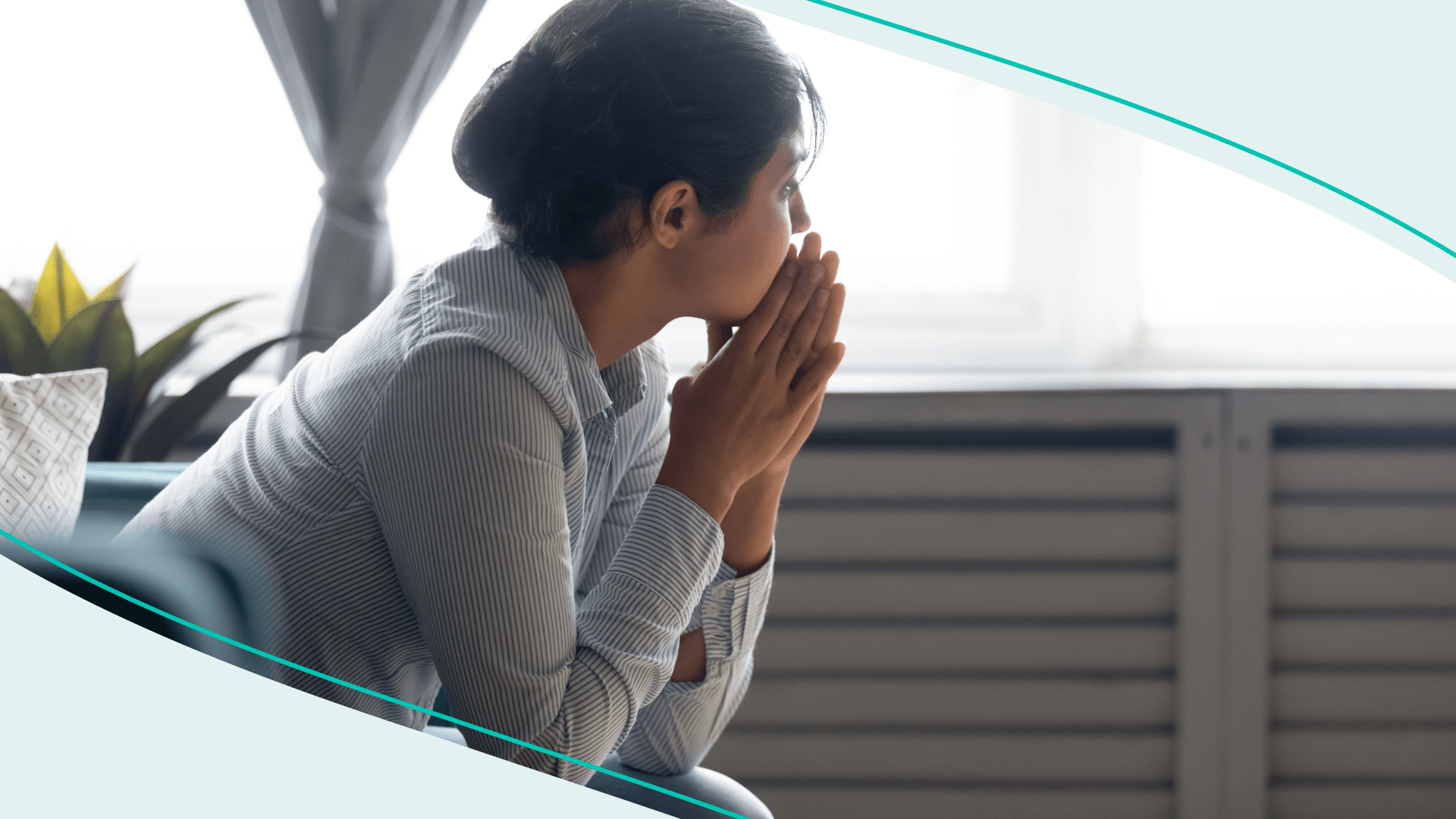 A woman looks away, pensive