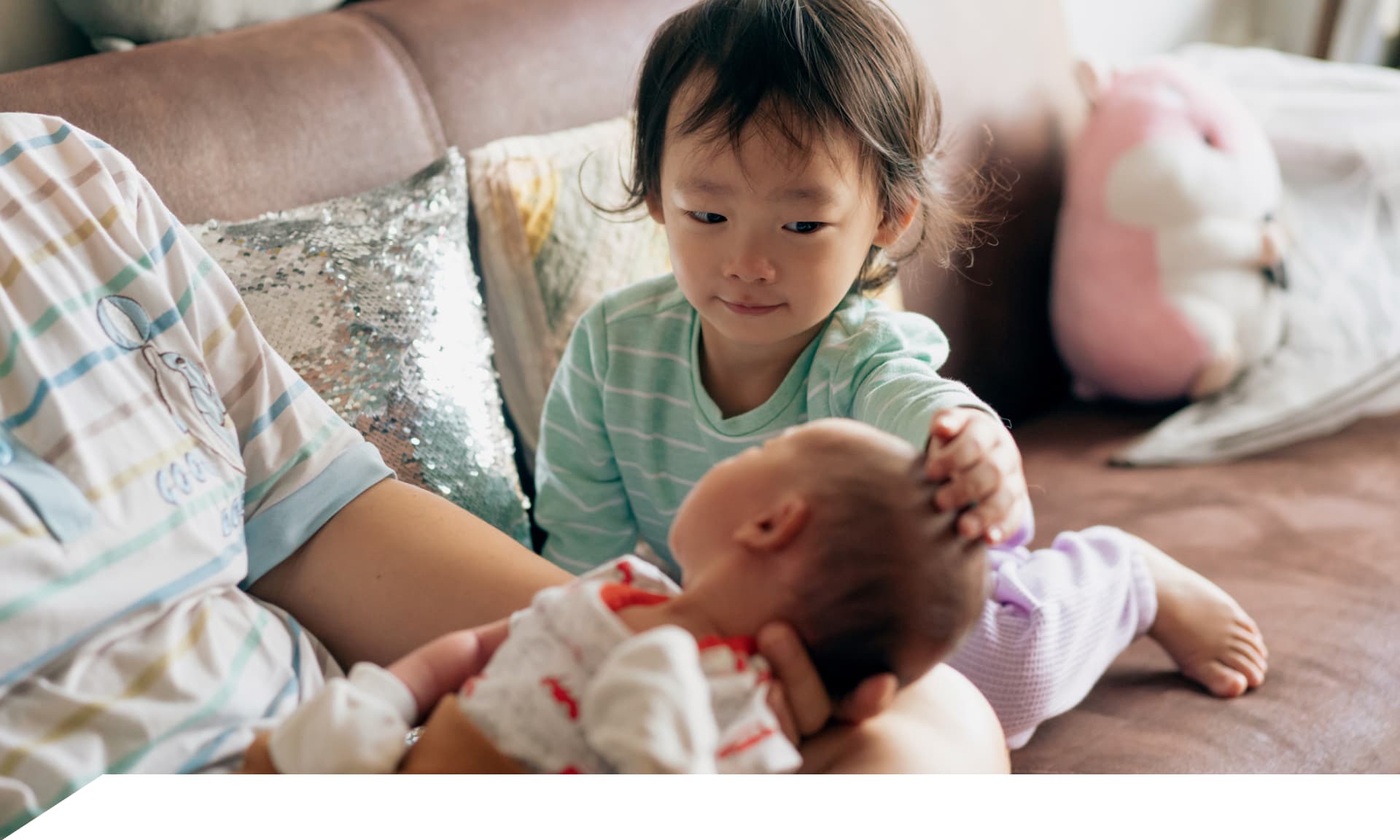 older brother and newborn sibling