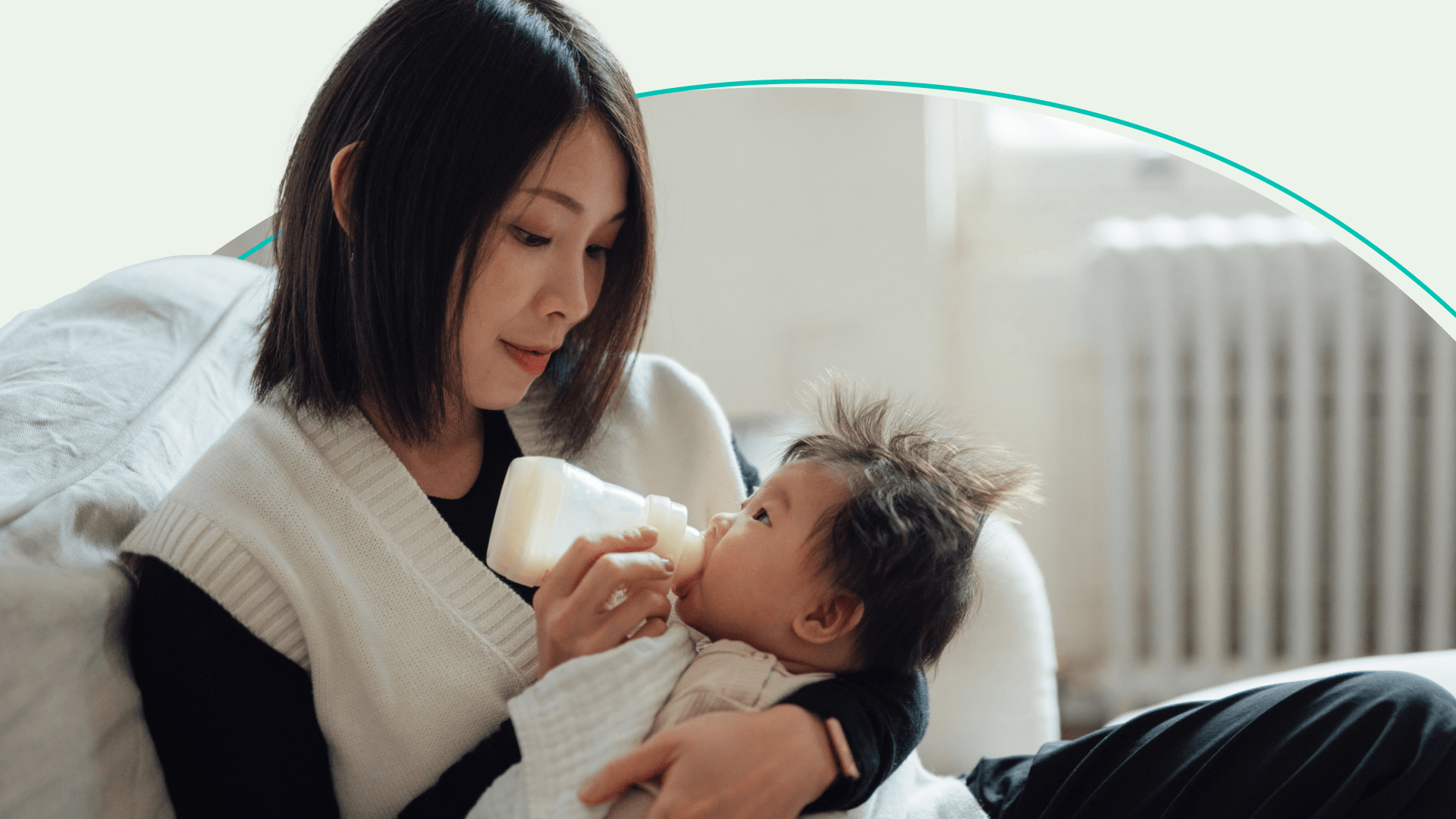 mother feeding her baby