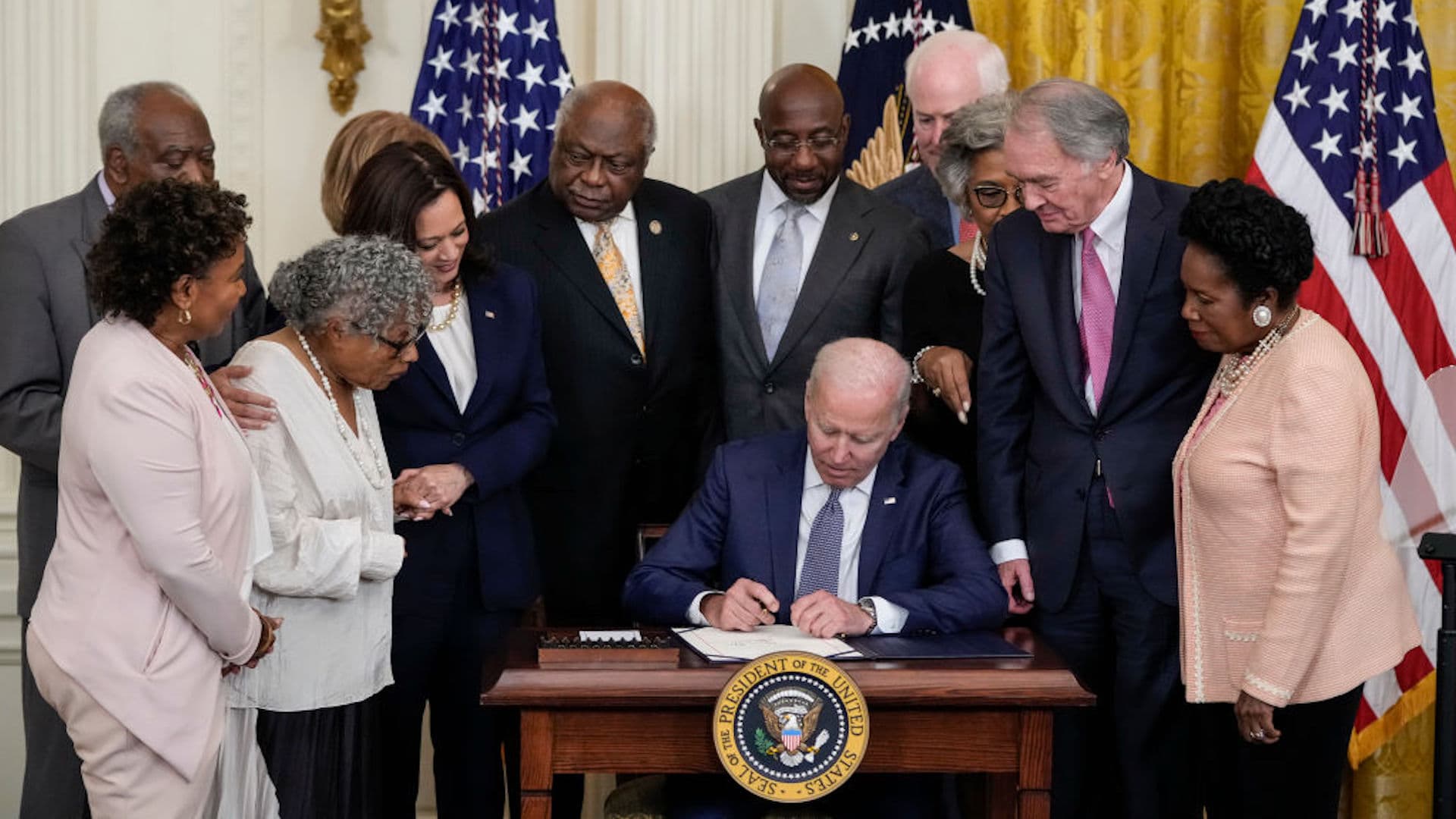 Biden signing Juneteenth legislation.