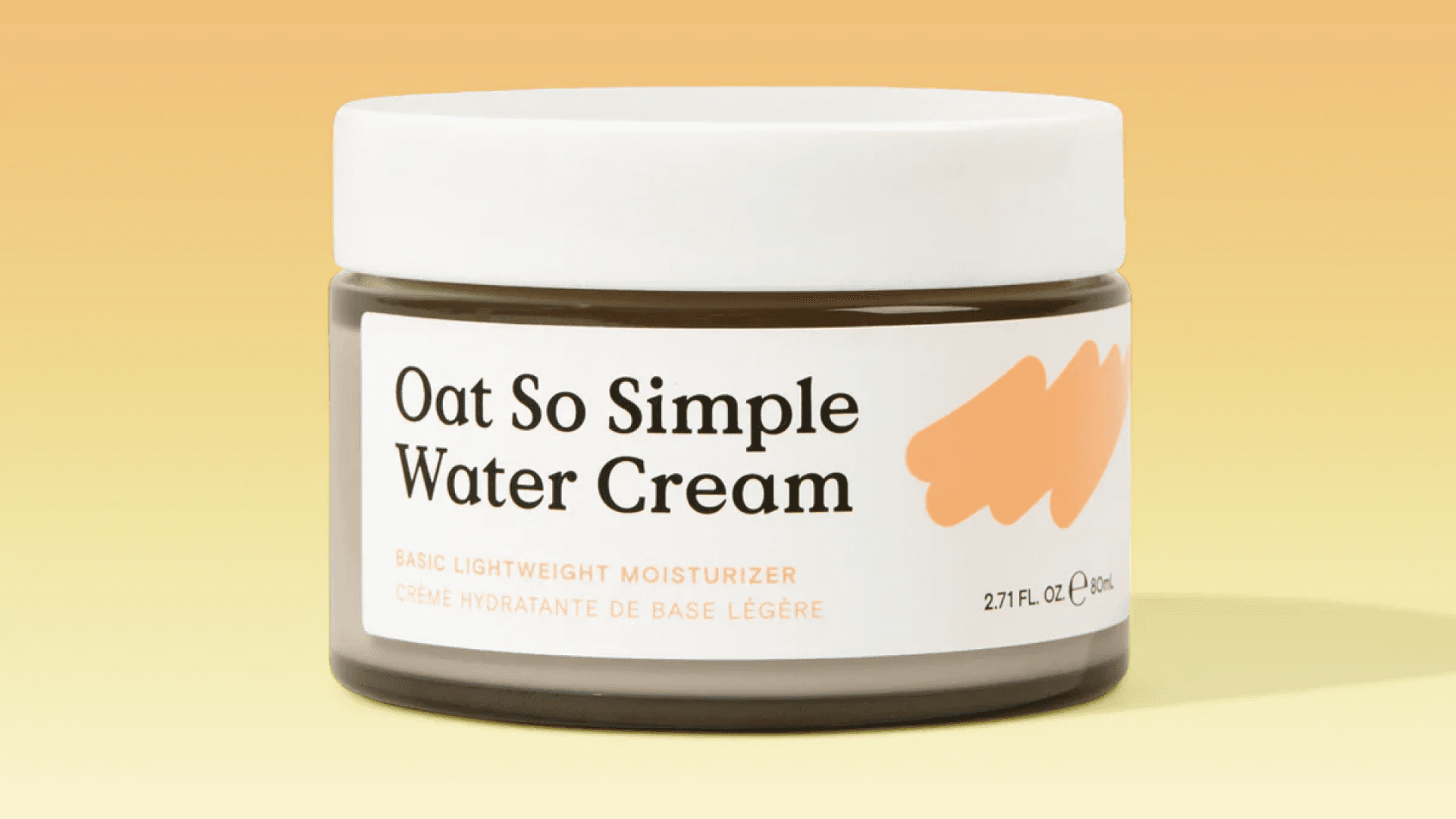 Jar of face cream on orange gradient background