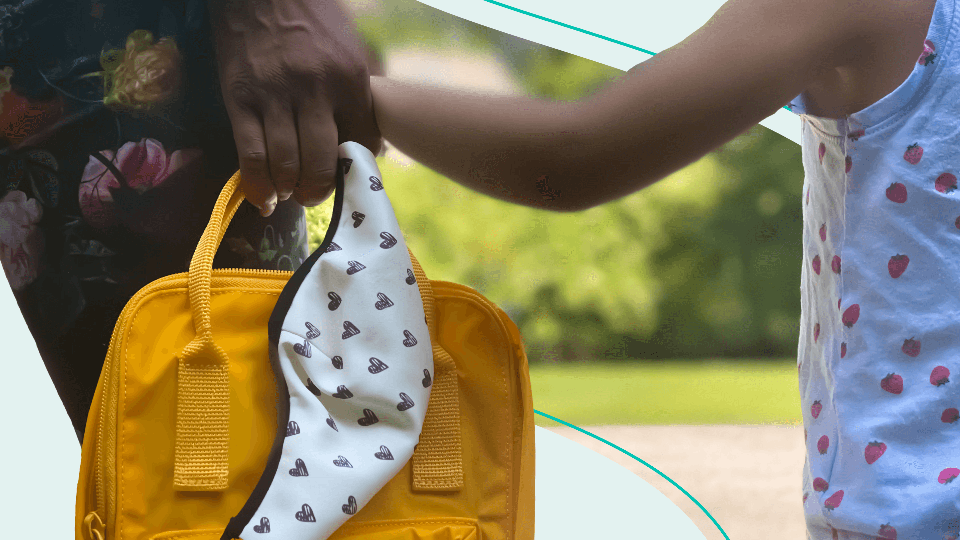 parent holding child's hand and mask