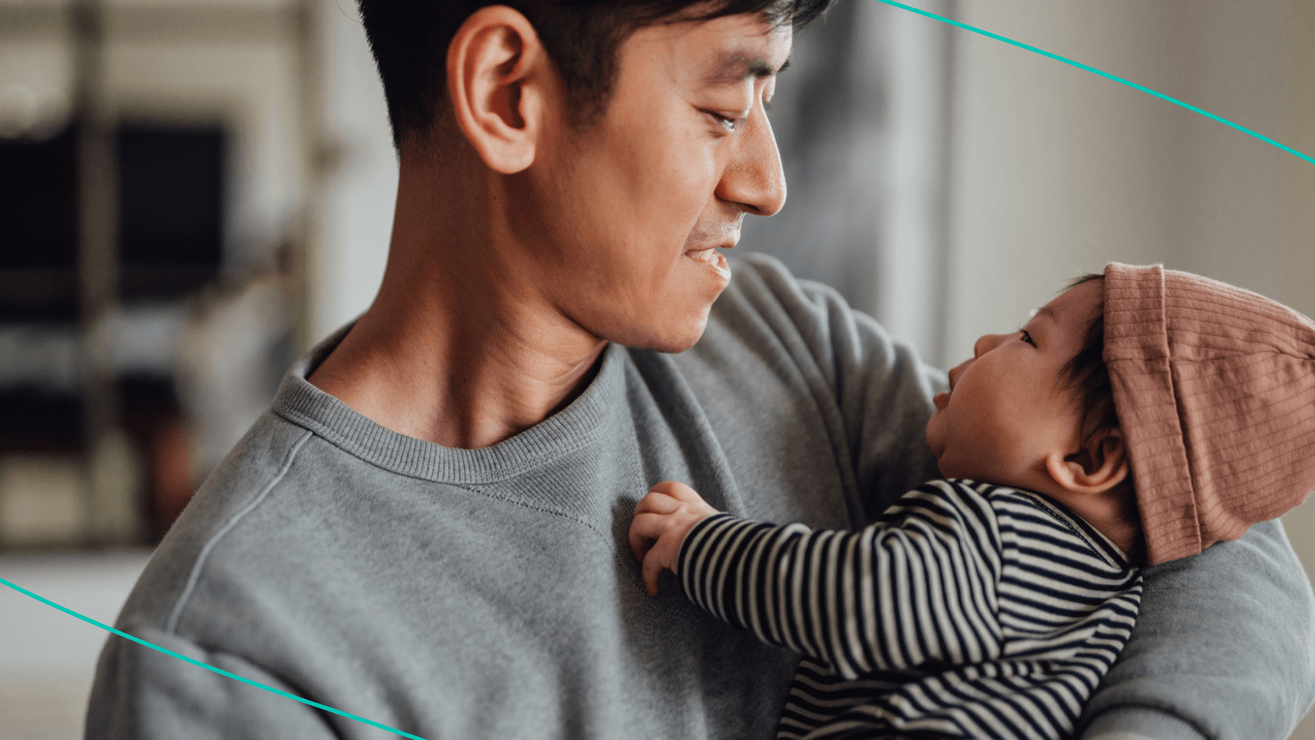 Dad holding baby