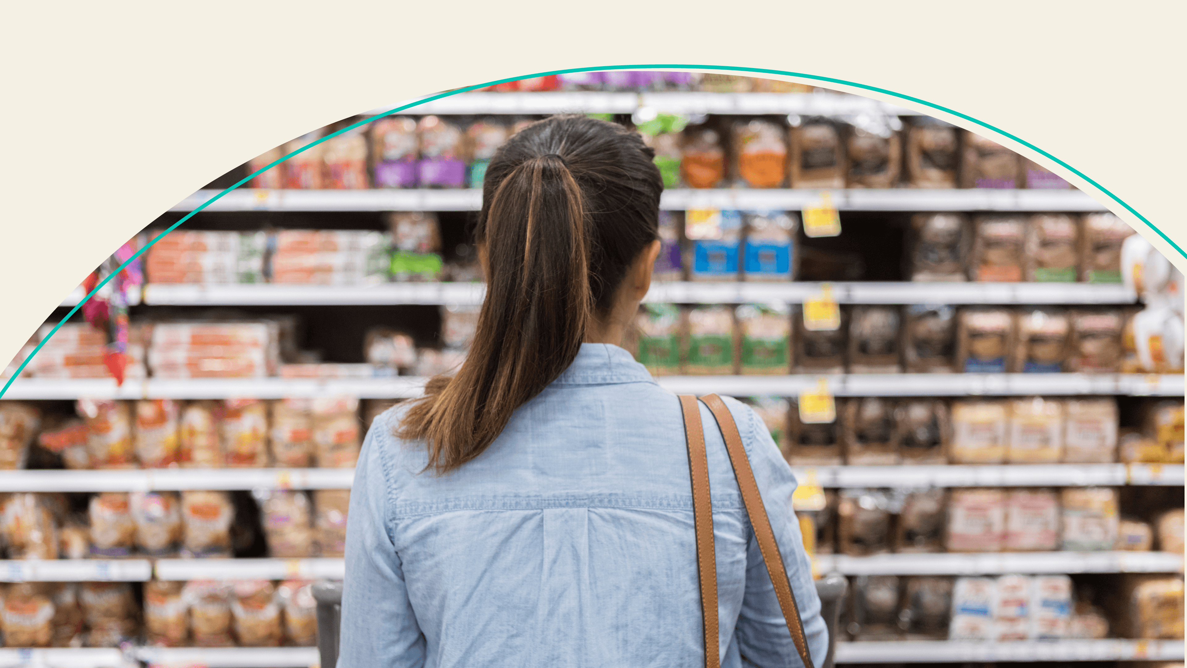A woman considering options at a grocery store.
