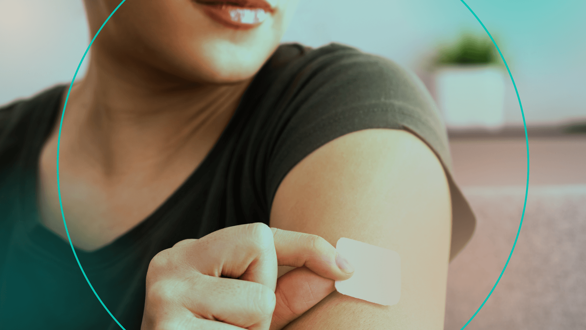 woman putting patch on her arm