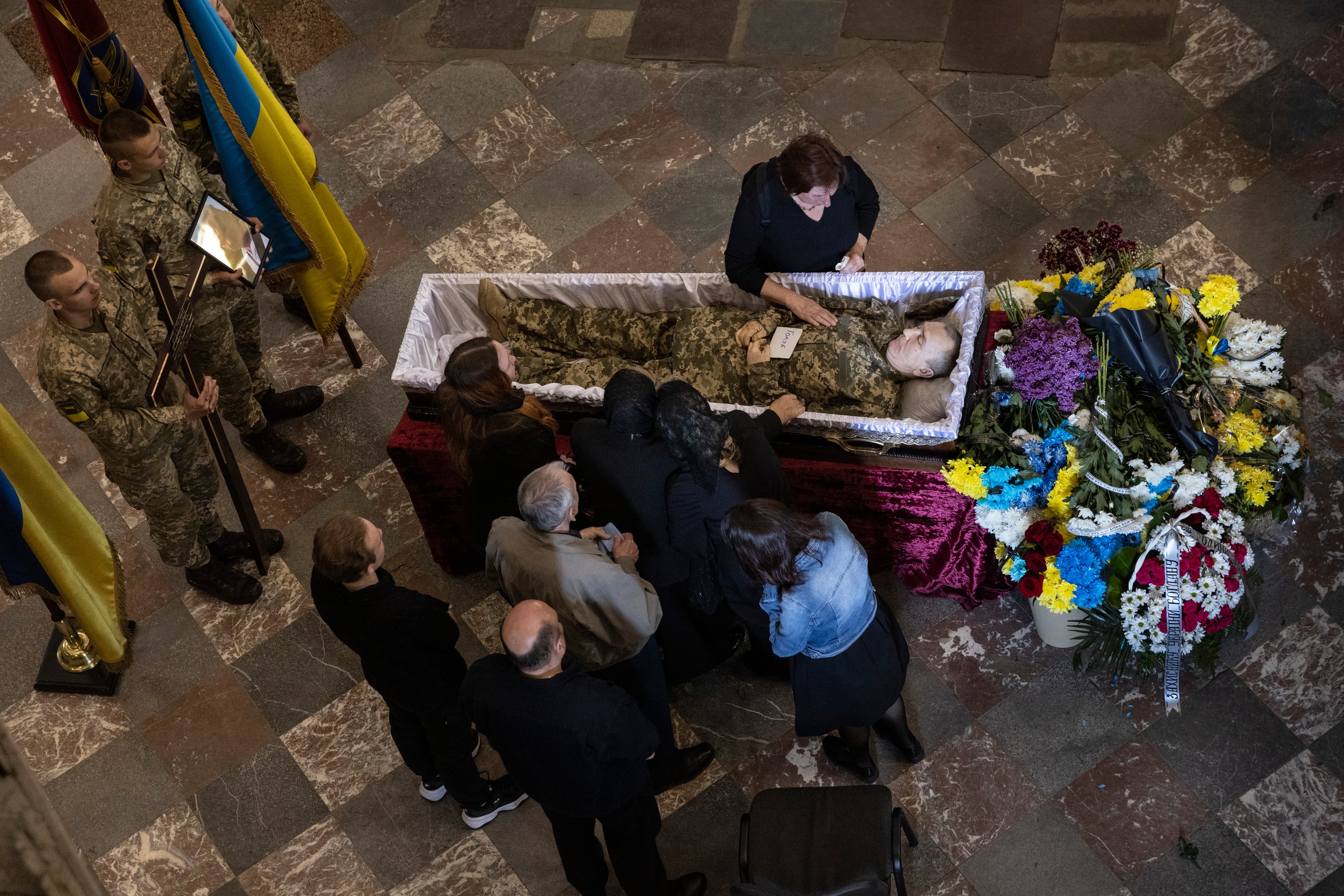 The body of Bogdan Volodymyrovych Holyb, 52, killed in the Luhansk region on May 15. Photo: © 2022 PAULA BRONSTEIN