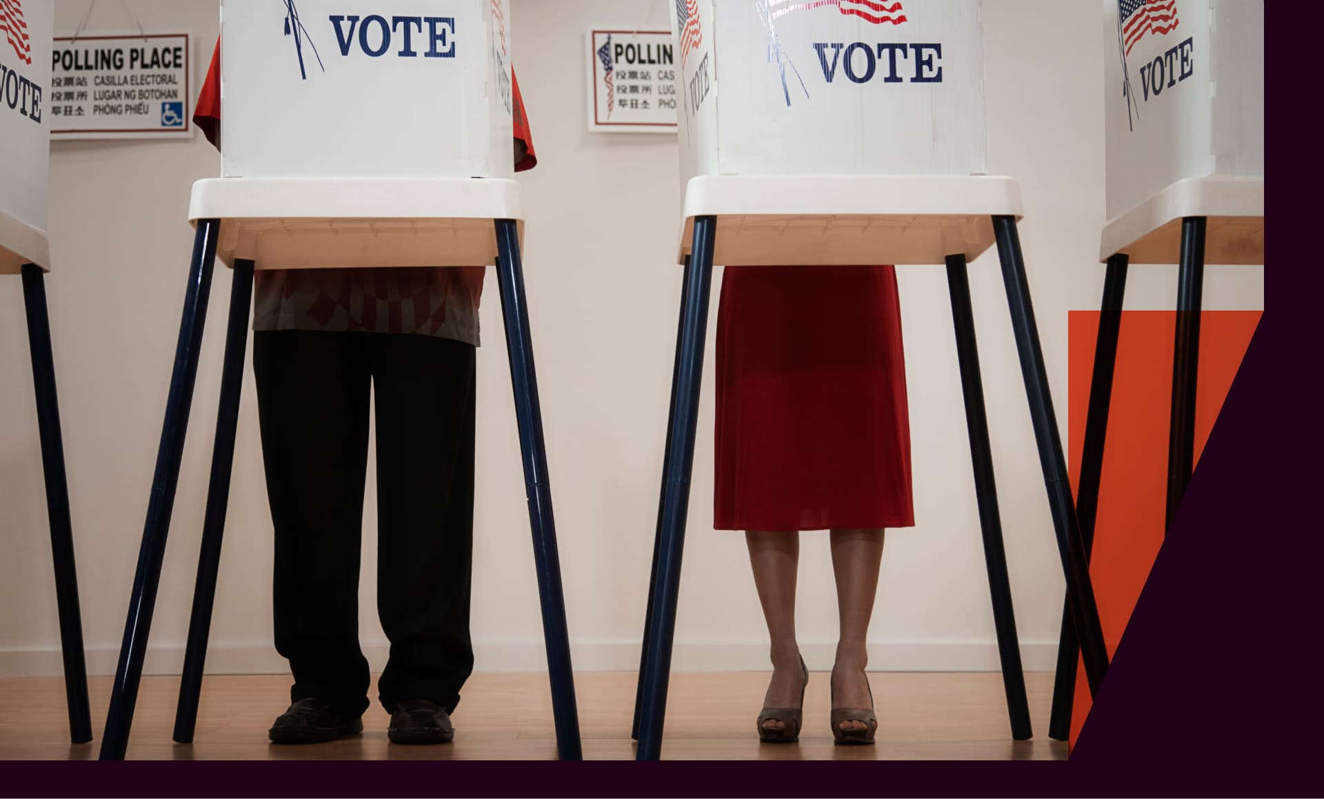 Voters stand at a polling place