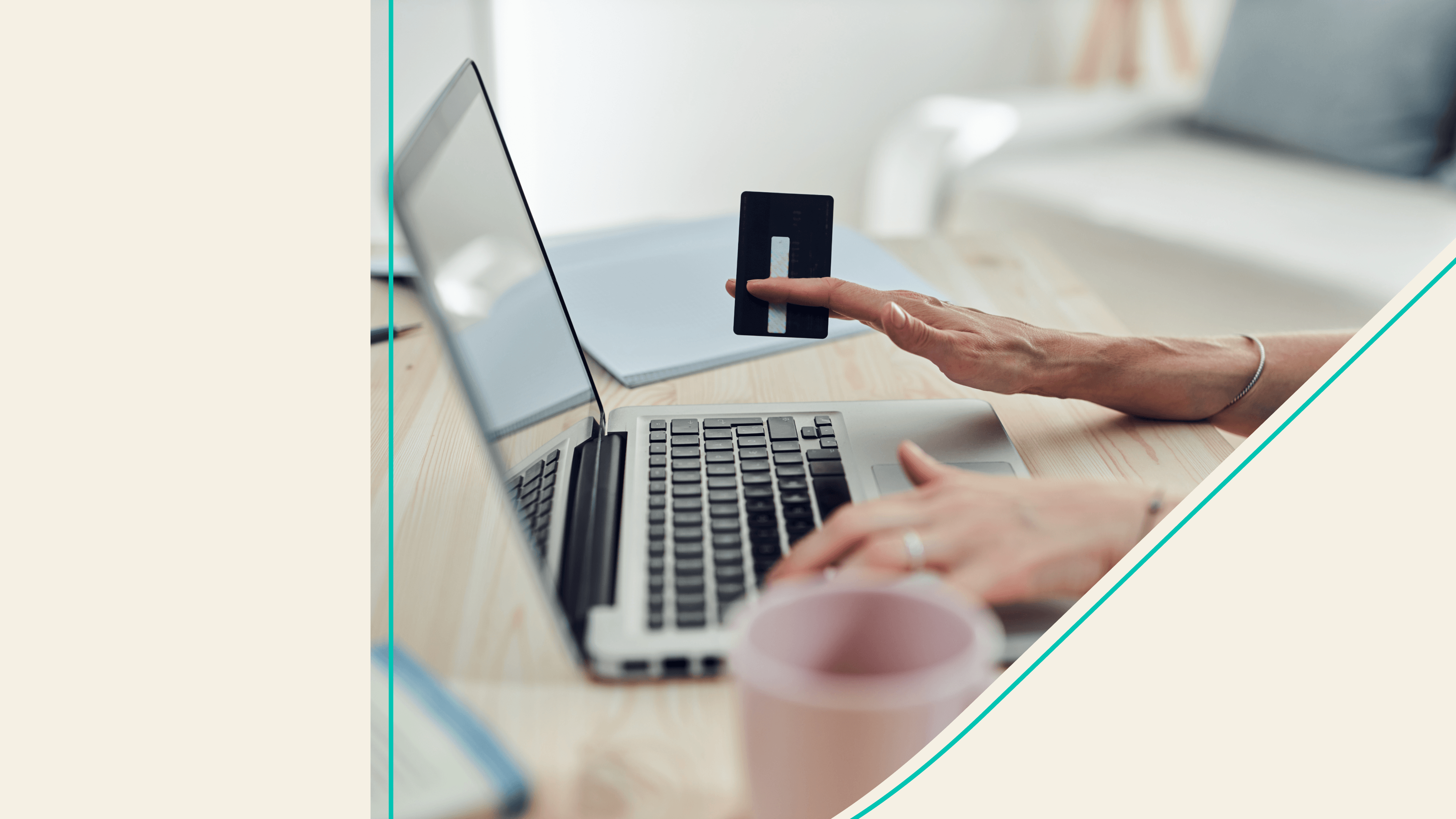 A person at a computer with a credit card