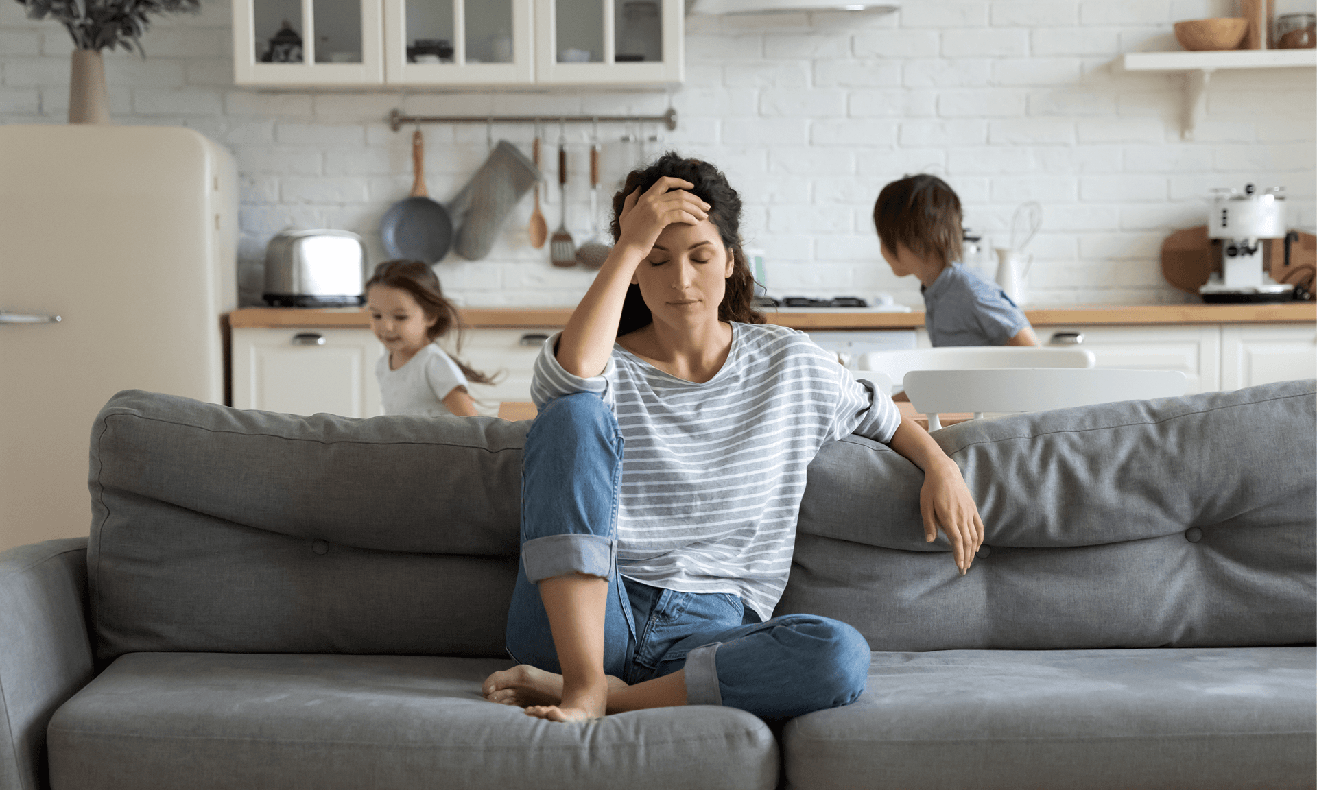Frustrated woman with kids running around