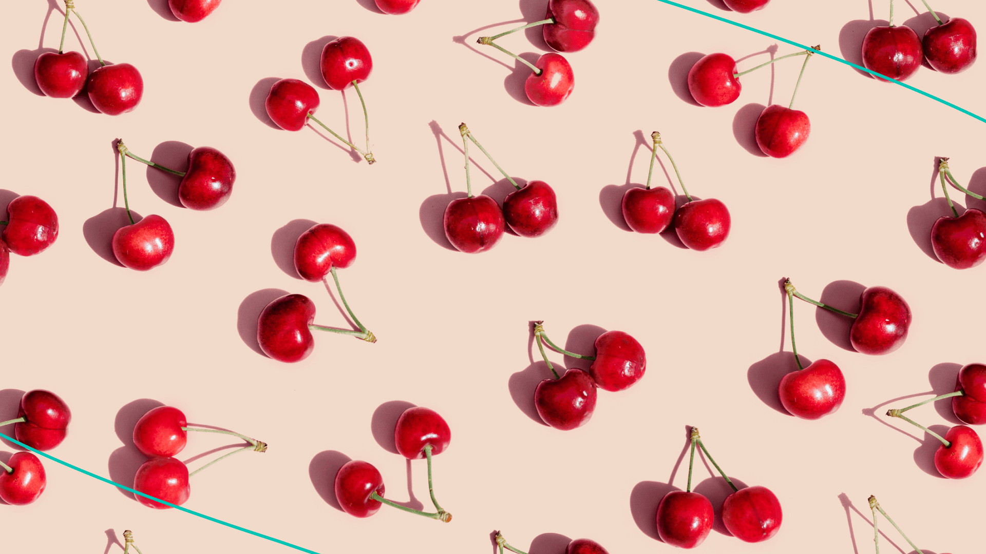 A graphic with lots of cherries across a pink background