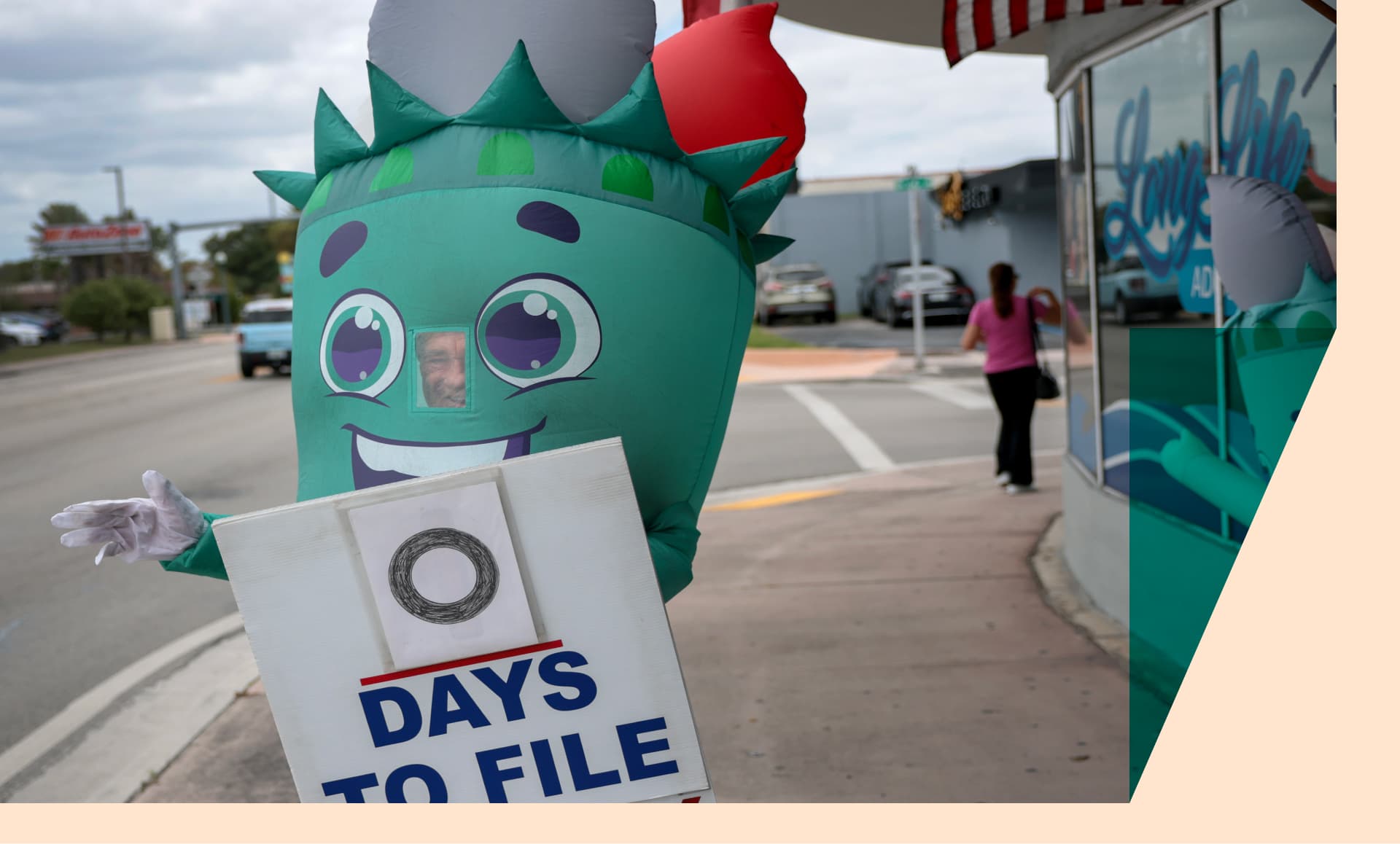 A Seine river bus boat docks in front the Eiffel Tower adorned with Olympic rings ahead of the Paris 2024 Olympic and Paralympic Games in Paris in July 16, 2024