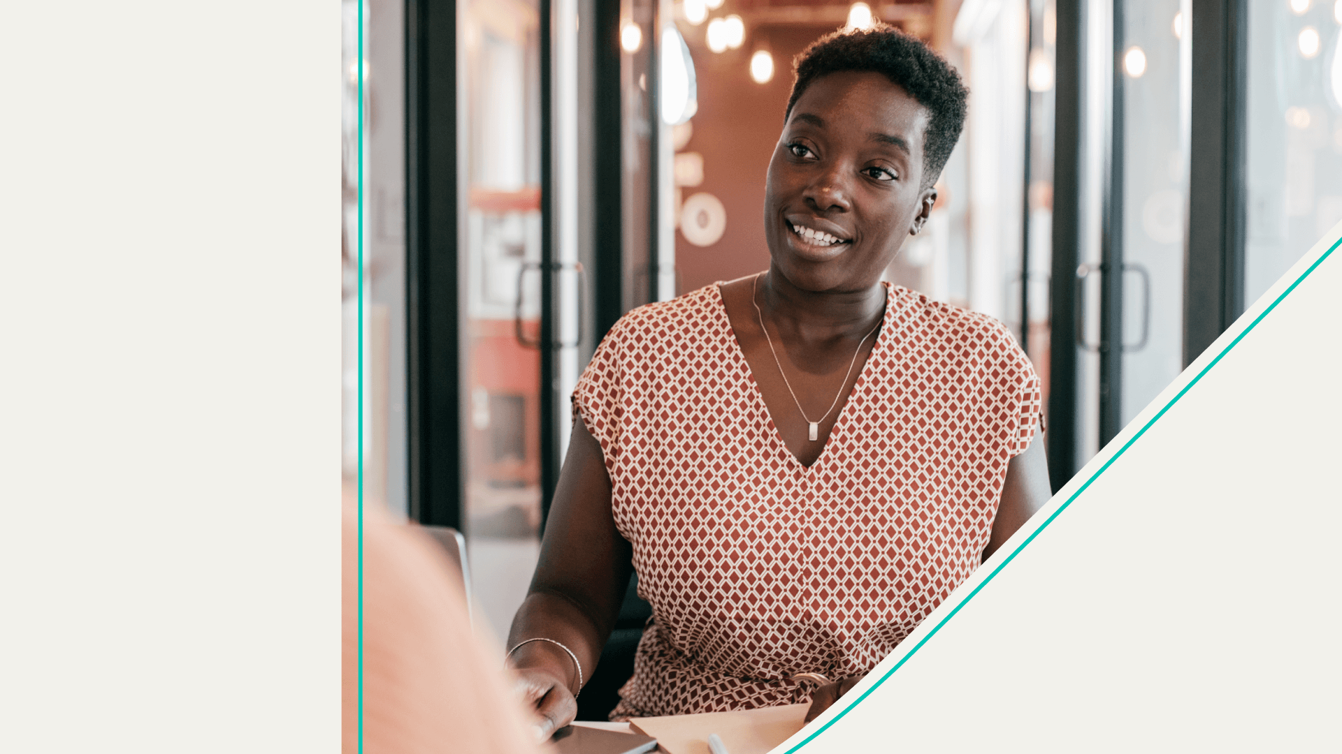 accessibility, woman at desk having a conversation