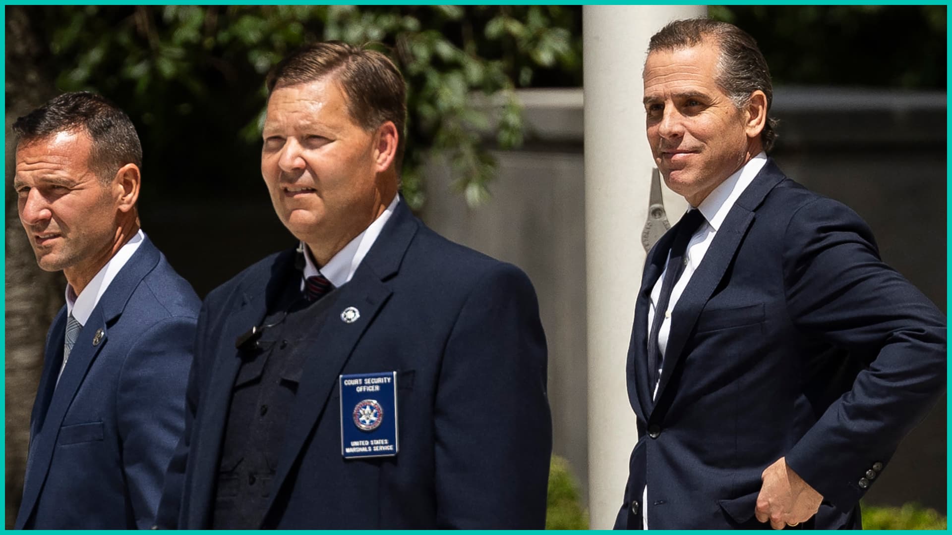 Hunter Biden (R), son of US President Joe Biden, leaves the J. Caleb Boggs Federal Building in Wilmington, Delaware,