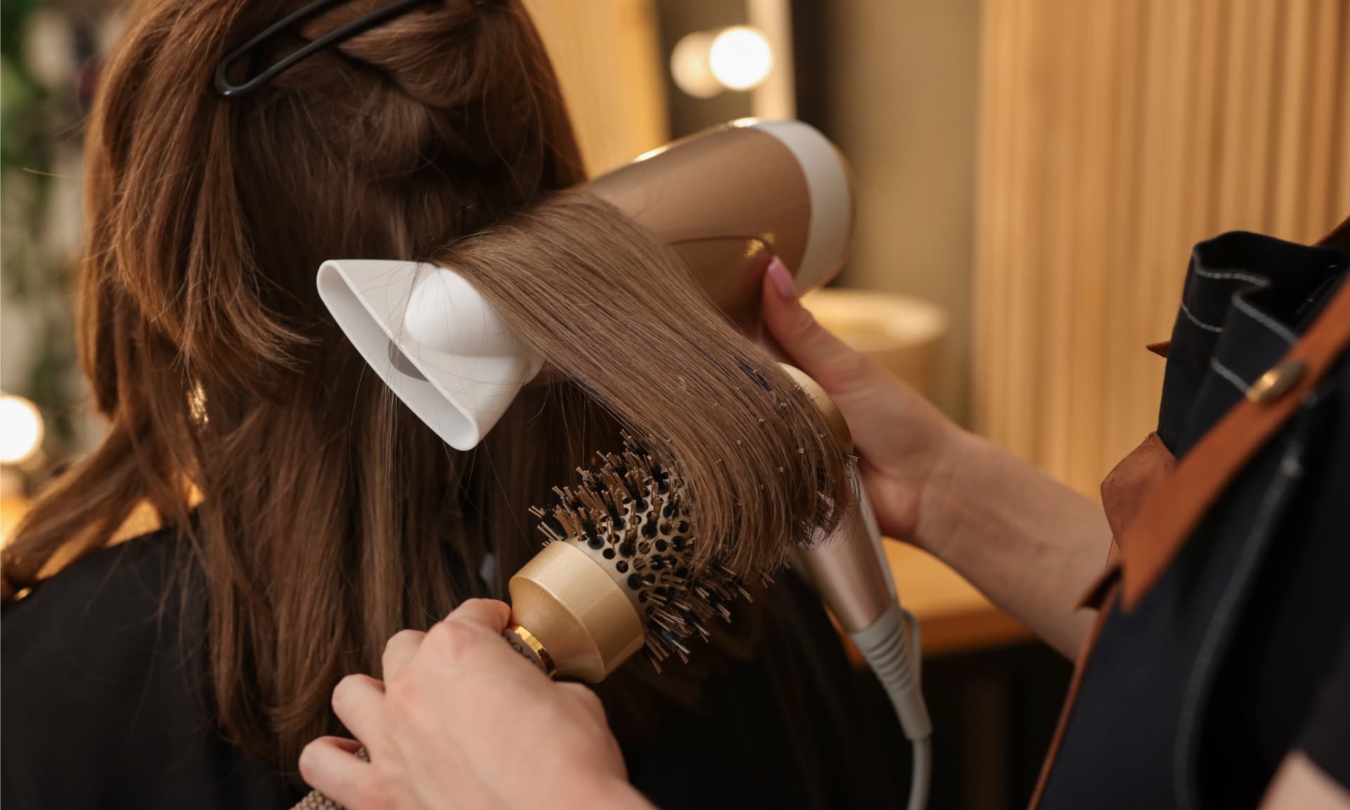 A woman getting her hair done at the salon.