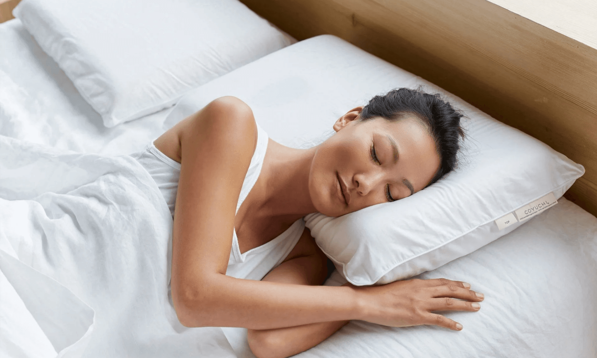 Woman sleeping on pillow