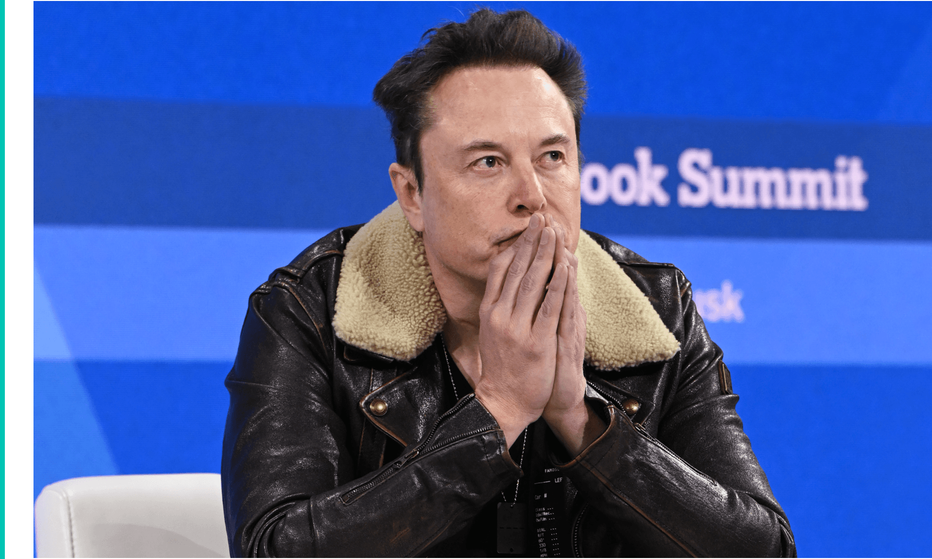 Elon Musk speaks onstage during The New York Times Dealbook Summit 2023