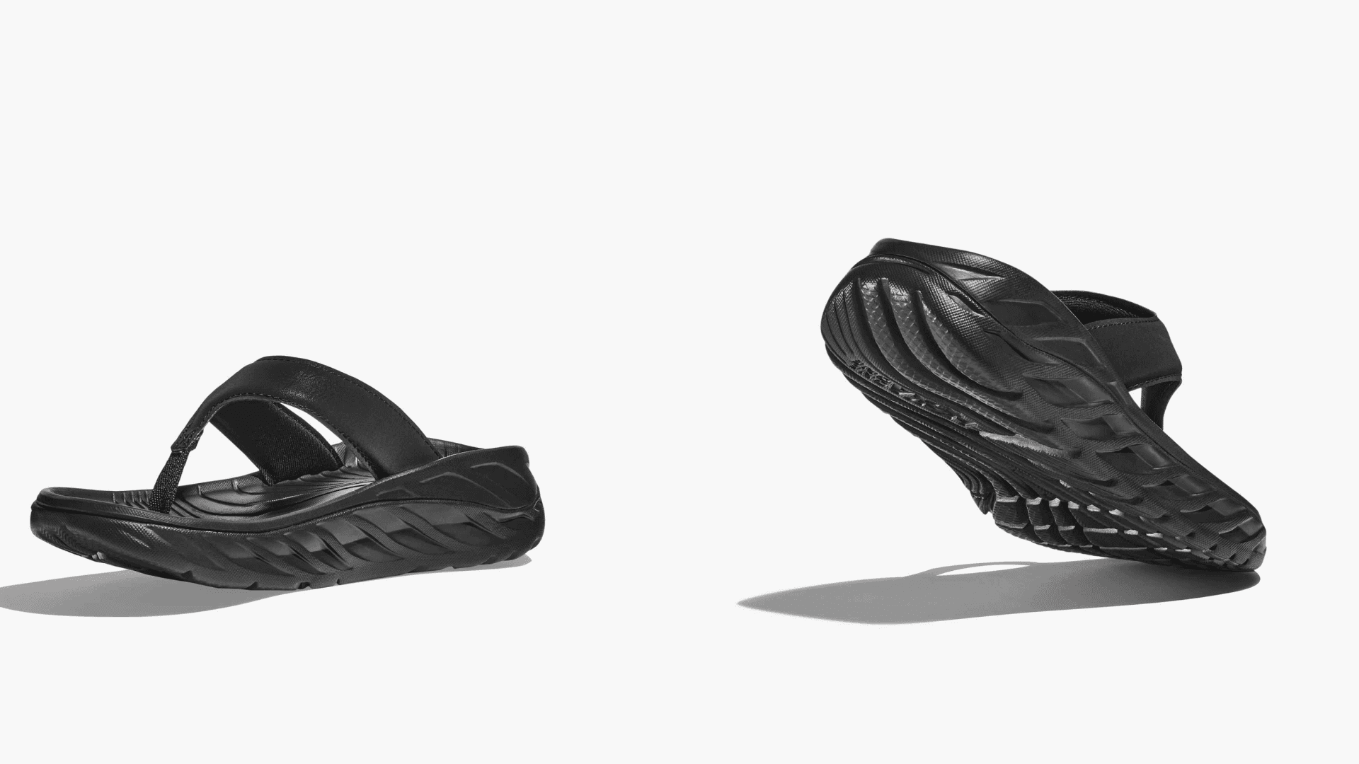 HOKA flip flops in black