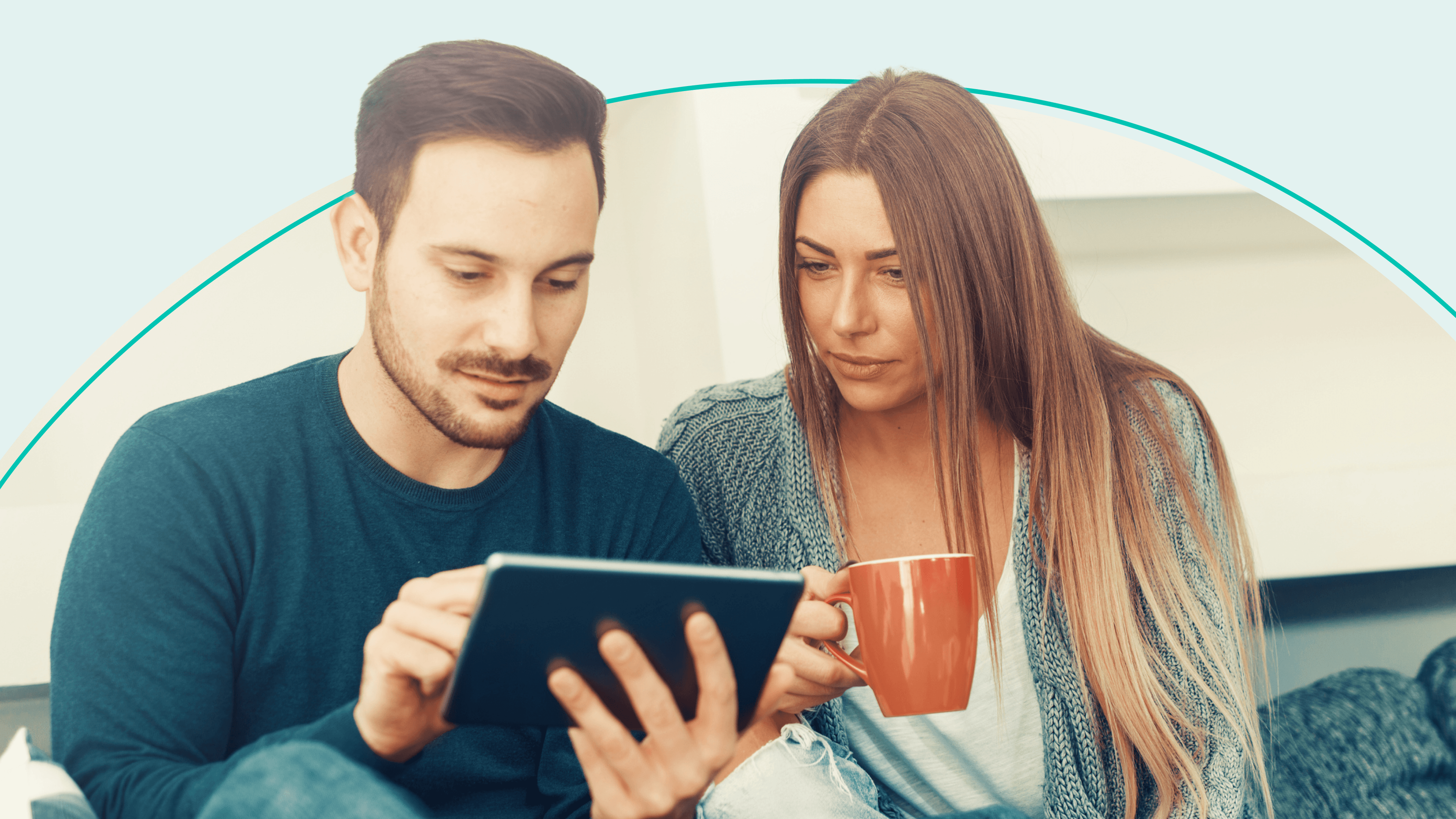 man and woman reviewing their financial accounts together