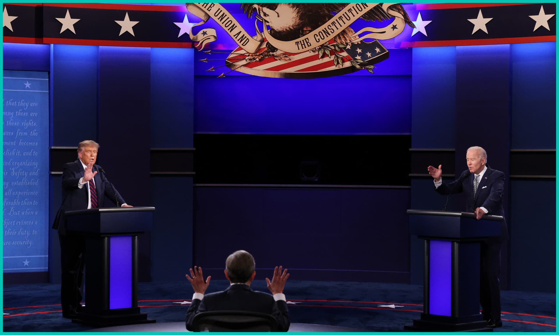 President Donald Trump and Democratic presidential nominee Joe Biden participate in the first presidential debate moderated by Fox News anchor Chris Wallace
