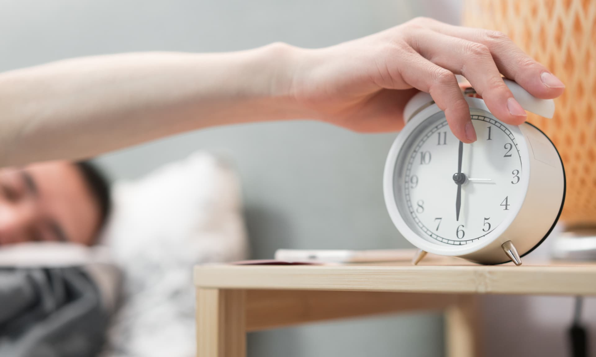 Someone hitting their alarm clock