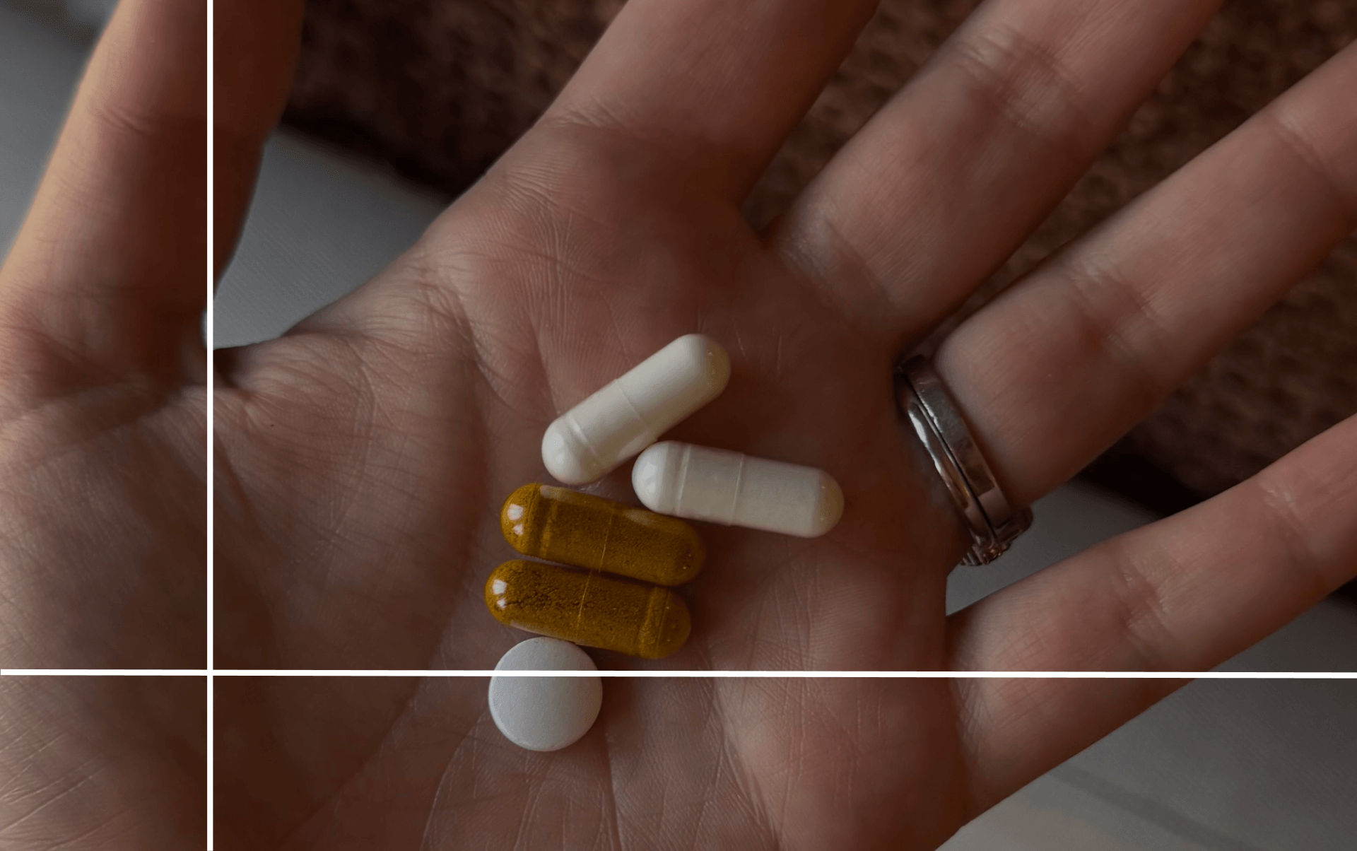 supplements in someone's hand