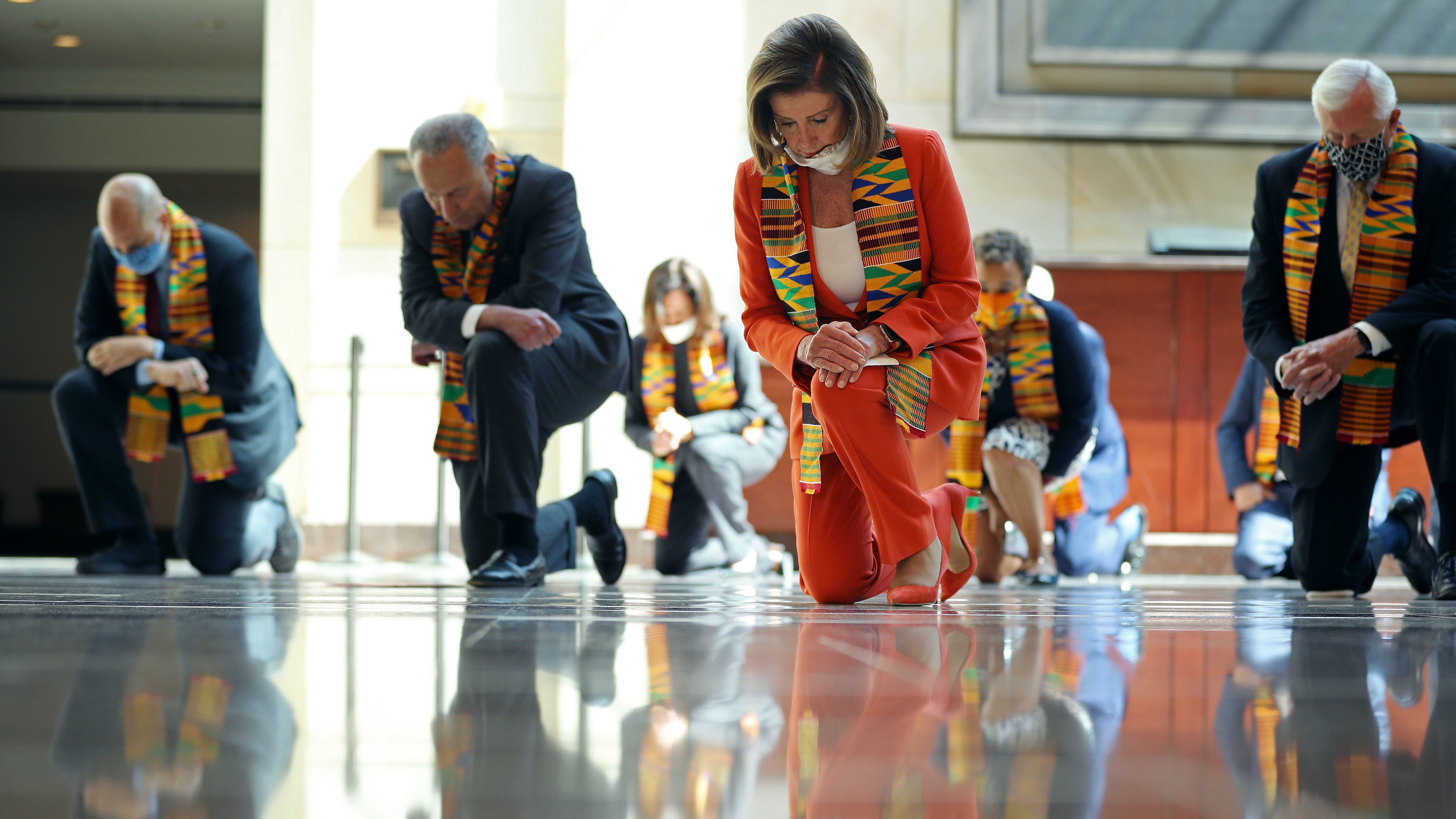 Democrats from the House and Senate kneel in silence for eight minutes and 46 seconds to honor George Floyd.